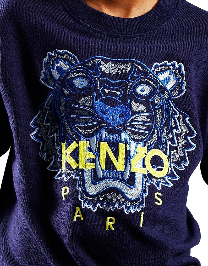 Unleash bold style with the KENZO Kids Tiger Face Sweatshirt (Navy) — a statement piece that captures the essence of KENZO’s legendary street-luxury aesthetic. 