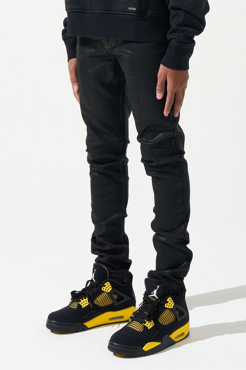 SERENEDE® Kids Onyx fitted black jeans with wax finish, five-pocket styling, and signature branded details.