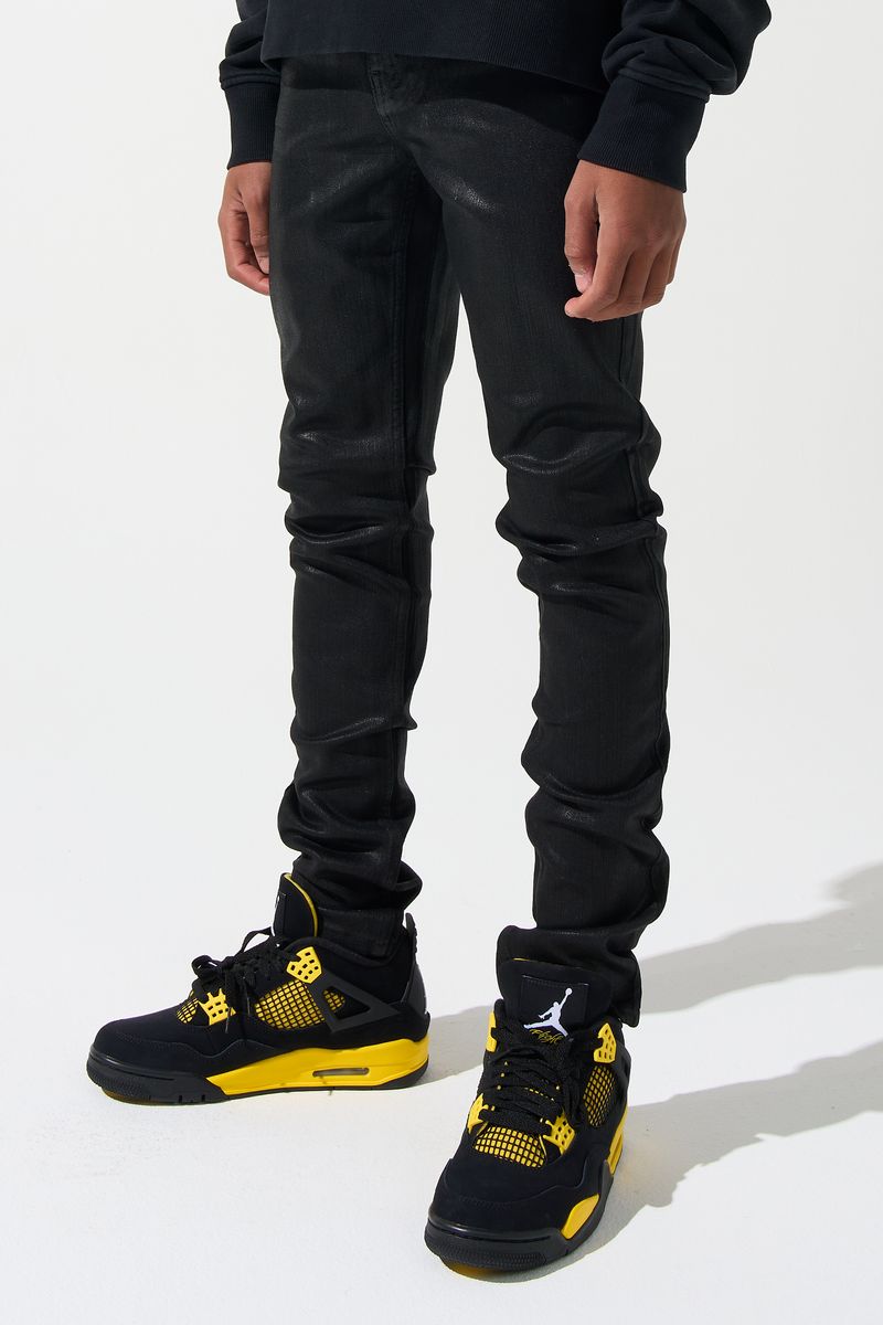 SERENEDE® Kids Onyx fitted black jeans with wax finish, five-pocket styling, and signature branded details.