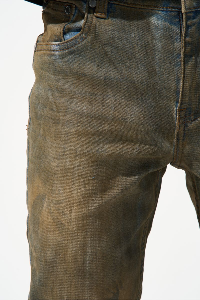 SERENEDE® Kids OUD fitted jeans in dark denim with brown overdye wash, knee distressing, and fading details.