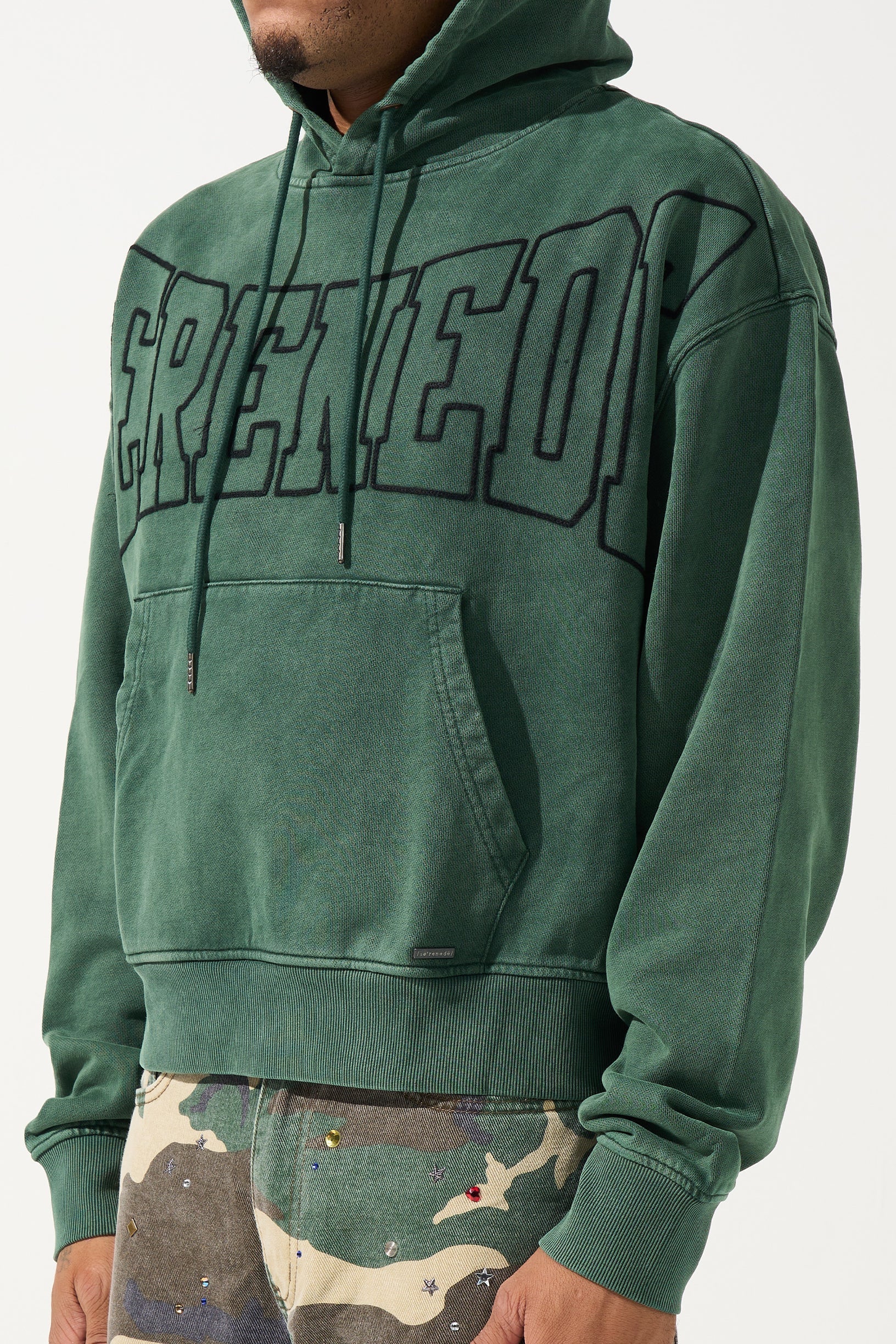 SERENEDE® LEGACY Hunter Hoodie in vintage hunter green with embroidered chest branding, kangaroo pocket, and relaxed streetwear fit.