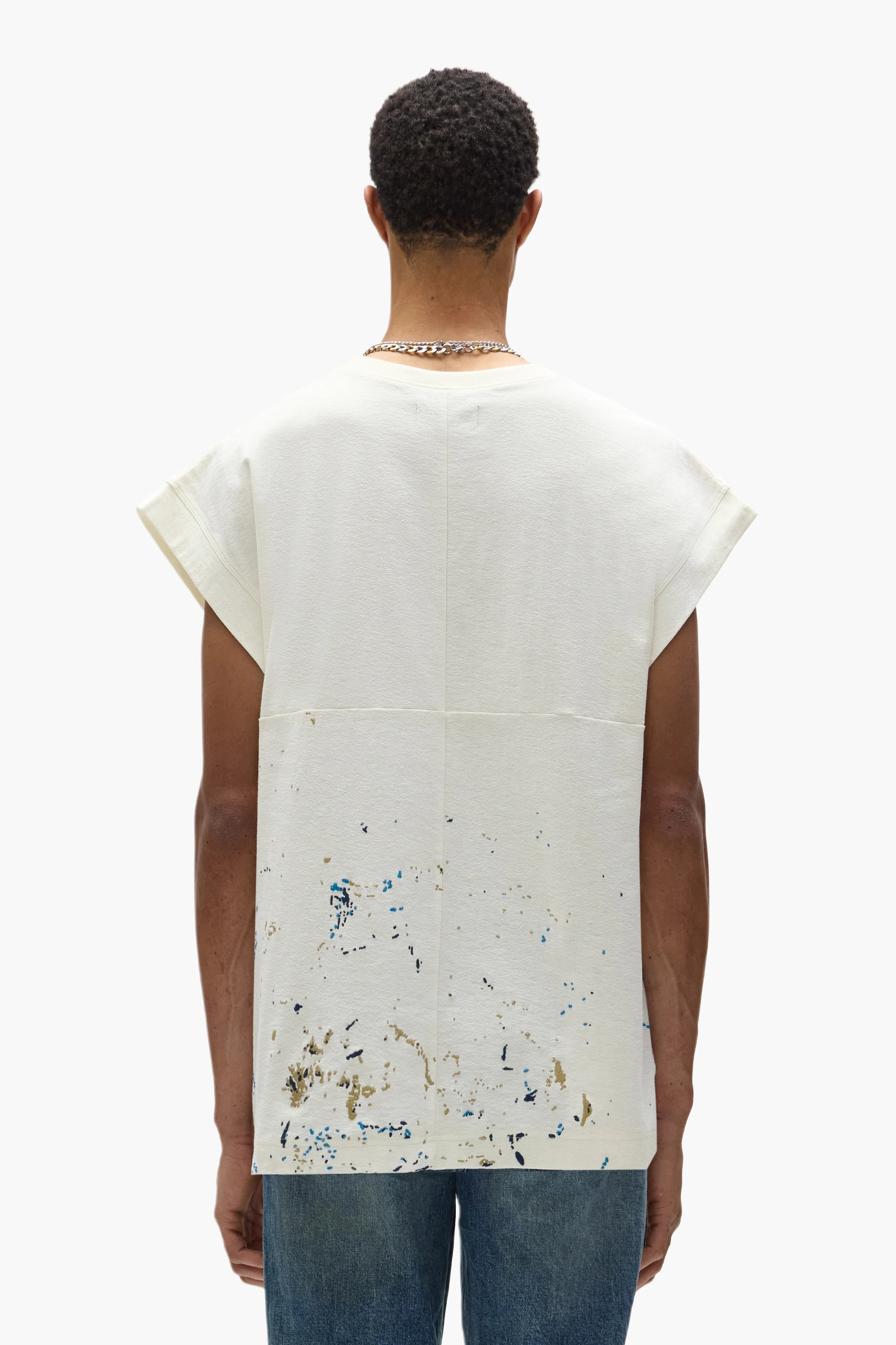 Purple Brand white sleeveless tee with oversized fit, chest graphic, and embroidery laid flat