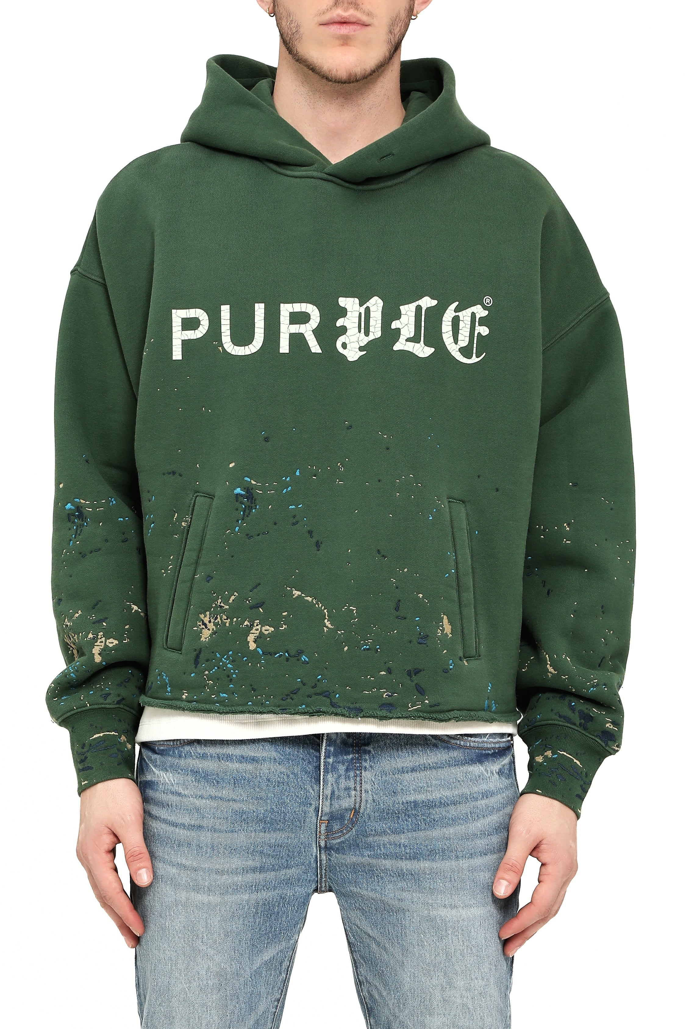Green hoodie with 'PURPLE' text on a white background