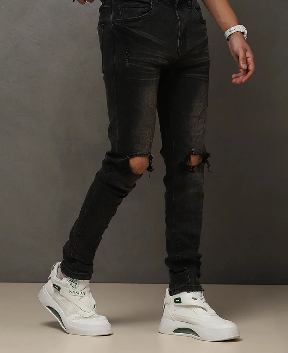 “W by Waimea Men’s Skinny Jeans: trendy blow-out knee design in stretchy woven denim (95% cotton, 3% rayon, 2% spandex). Sleek, stylish, and durable.”