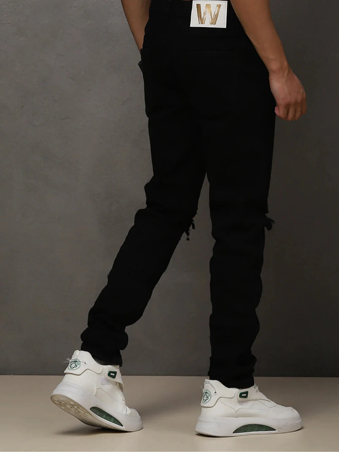 “W by Waimea Men’s Skinny Jeans: trendy blow-out knee design in stretchy woven denim (95% cotton, 3% rayon, 2% spandex). Sleek, stylish, and durable.”