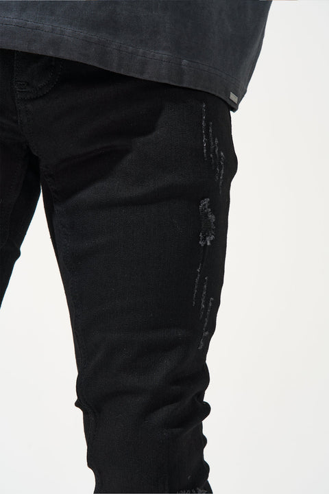 SERENEDE® Midnight Black skinny jeans in jet-black wash with high-stretch material, distressing, and branded hardware.