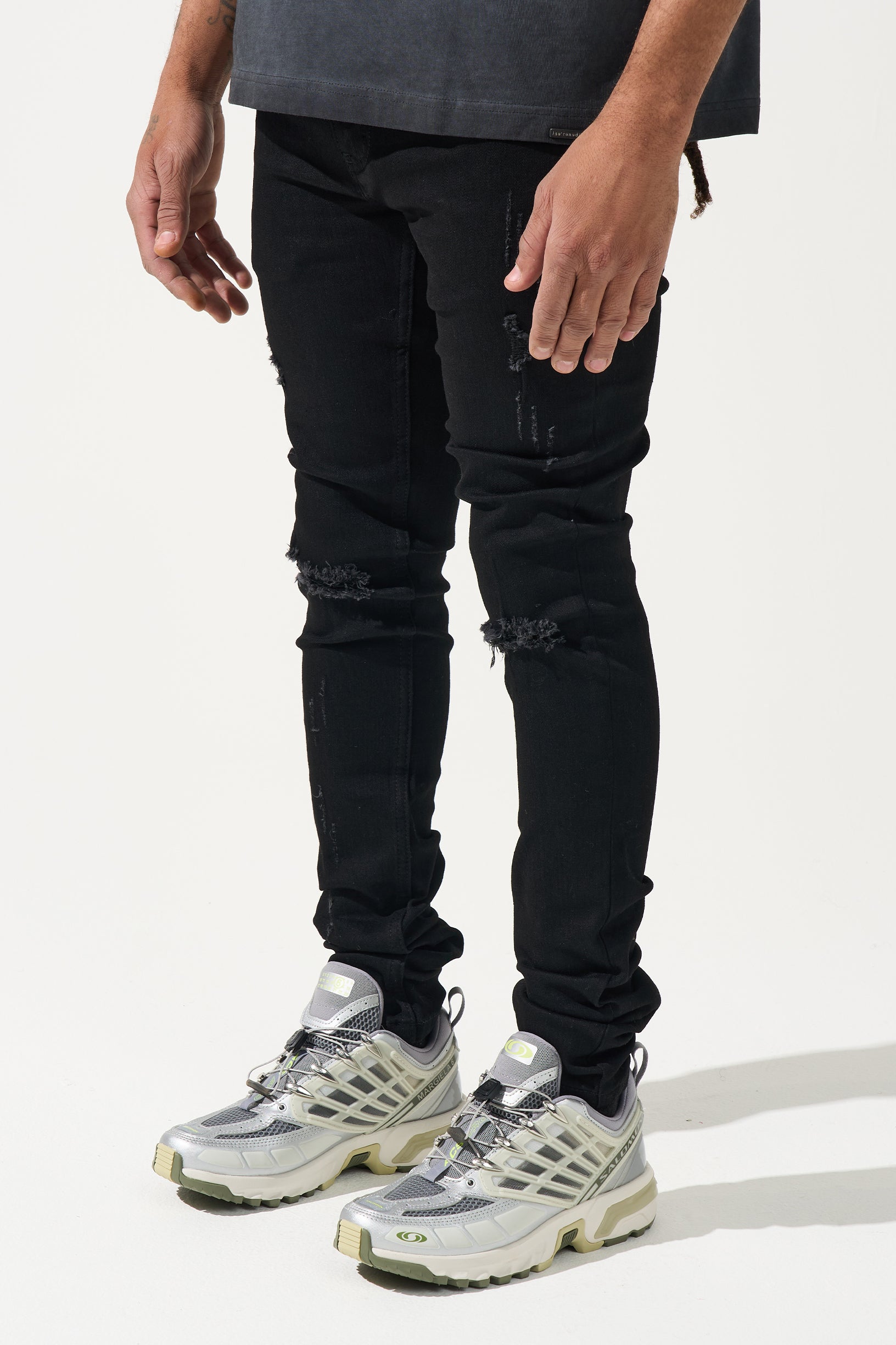 SERENEDE® Midnight Black skinny jeans in jet-black wash with high-stretch material, distressing, and branded hardware.