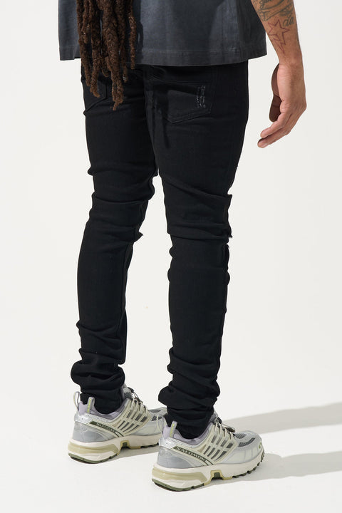SERENEDE® Midnight Black skinny jeans in jet-black wash with high-stretch material, distressing, and branded hardware.