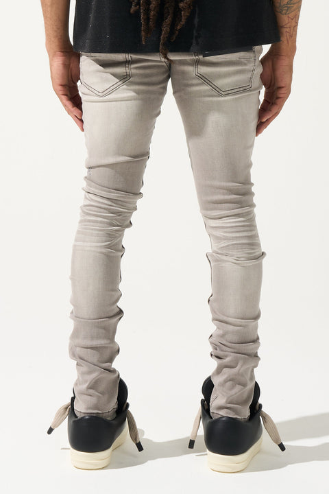 SERENEDE Marine Layer Jeans in cool grey wash with minimal knee distressing and skinny fit.