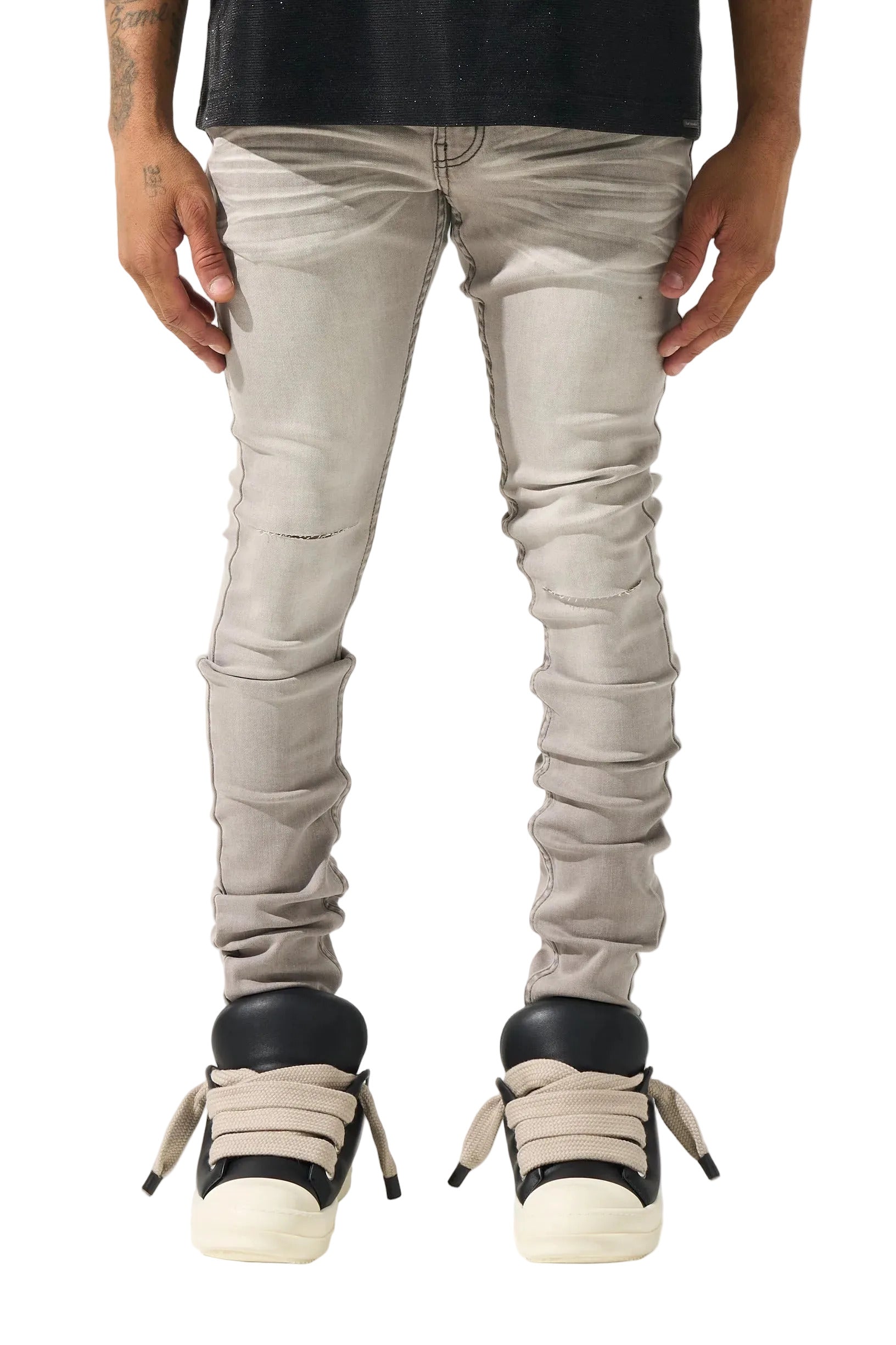 SERENEDE Marine Layer Jeans in cool grey wash with minimal knee distressing and skinny fit.