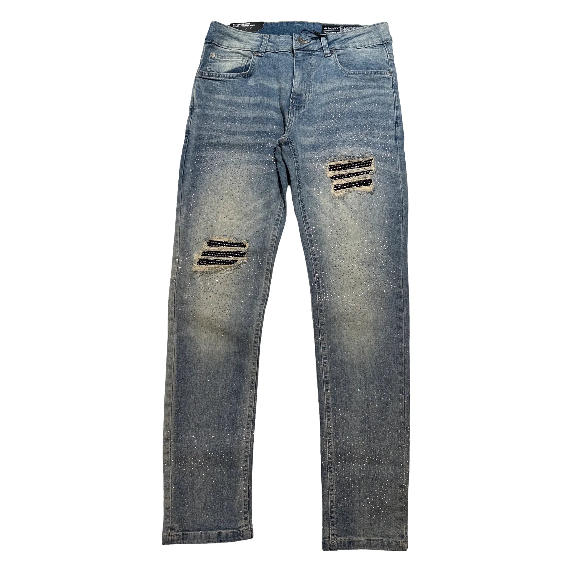  Vintage wash slim-fit jeans with rhinestone detailing, ripped knees, and contrast patchwork.