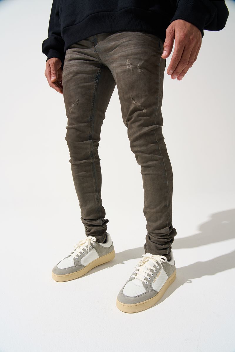 SERENEDE® Nightfall fitted denim jeans in night blue wash with whiskering, overdye finish, and signature branded details.