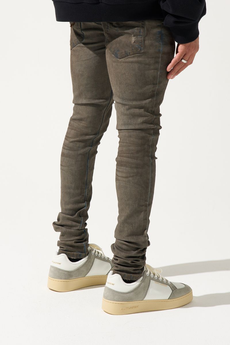 SERENEDE® Nightfall fitted denim jeans in night blue wash with whiskering, overdye finish, and signature branded details.