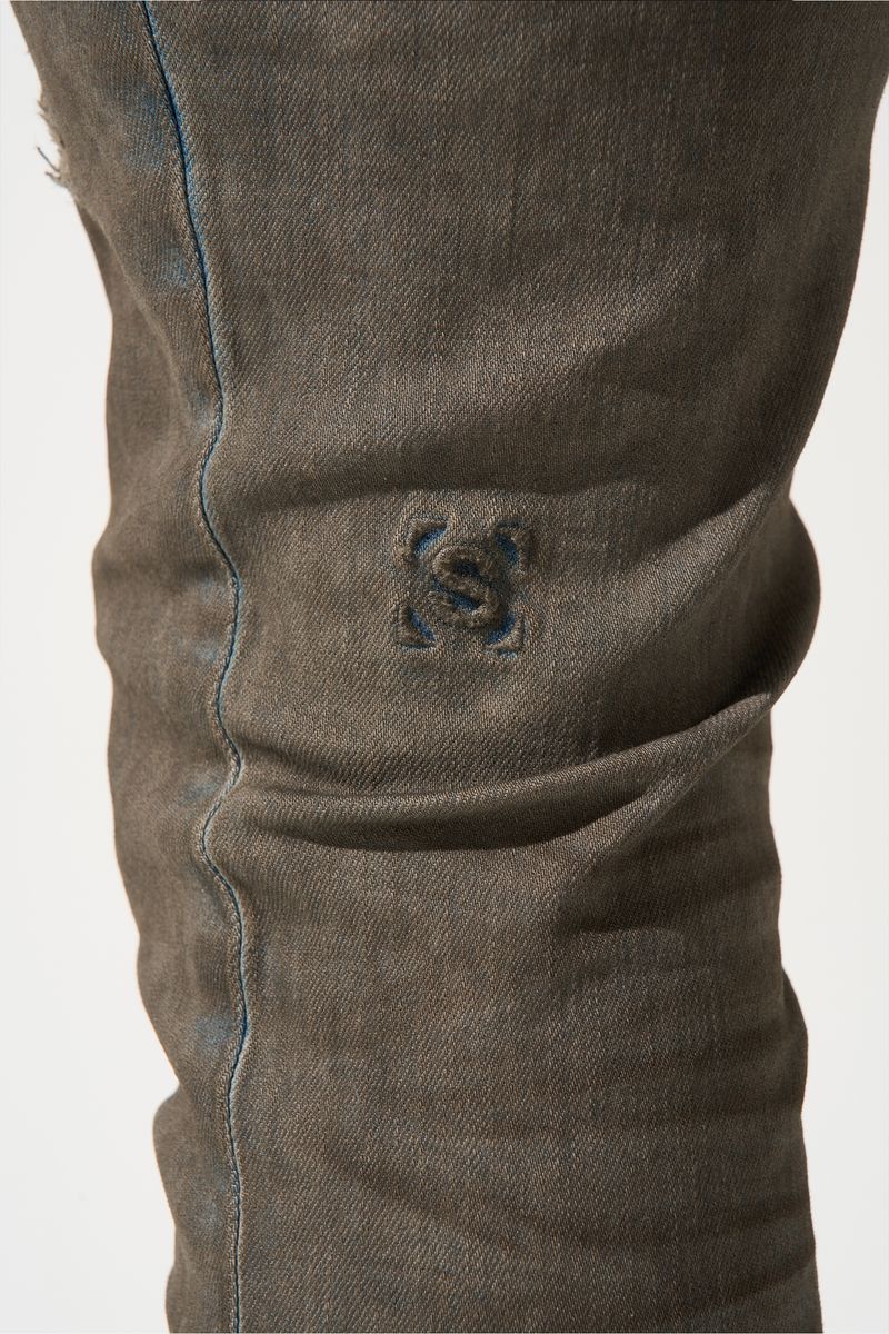 SERENEDE® Nightfall fitted denim jeans in night blue wash with whiskering, overdye finish, and signature branded details.