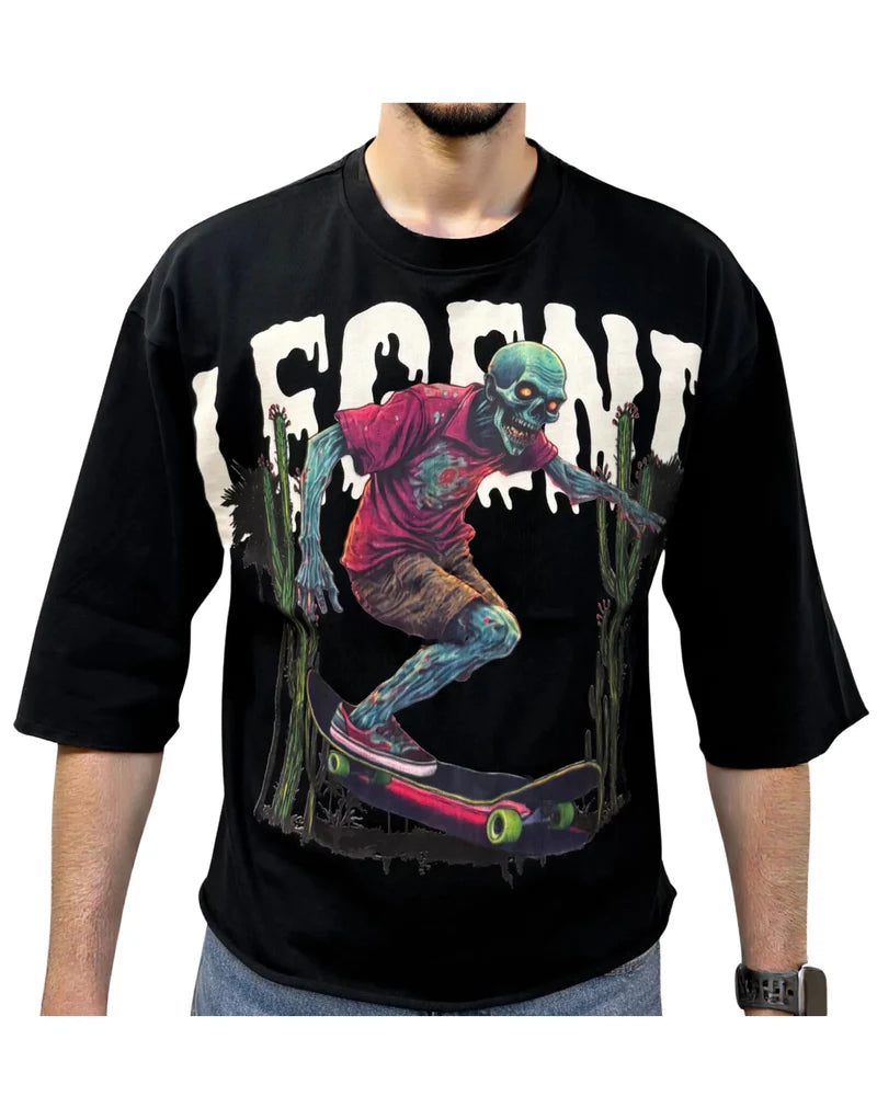 Black t-shirt with a graphic design of a zombie on a skateboard