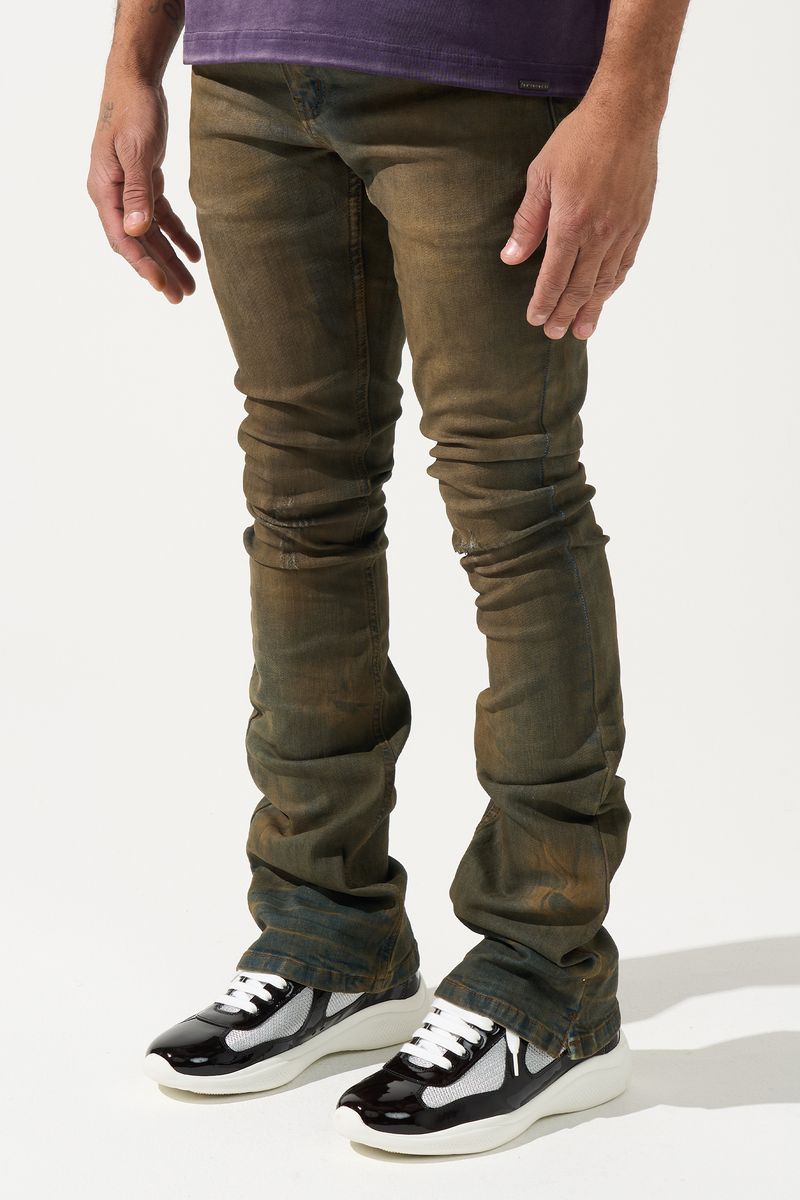 SERENEDE® OUD stacked jeans in dark denim with brown overdye, knee distressing, and signature stacked silhouette.