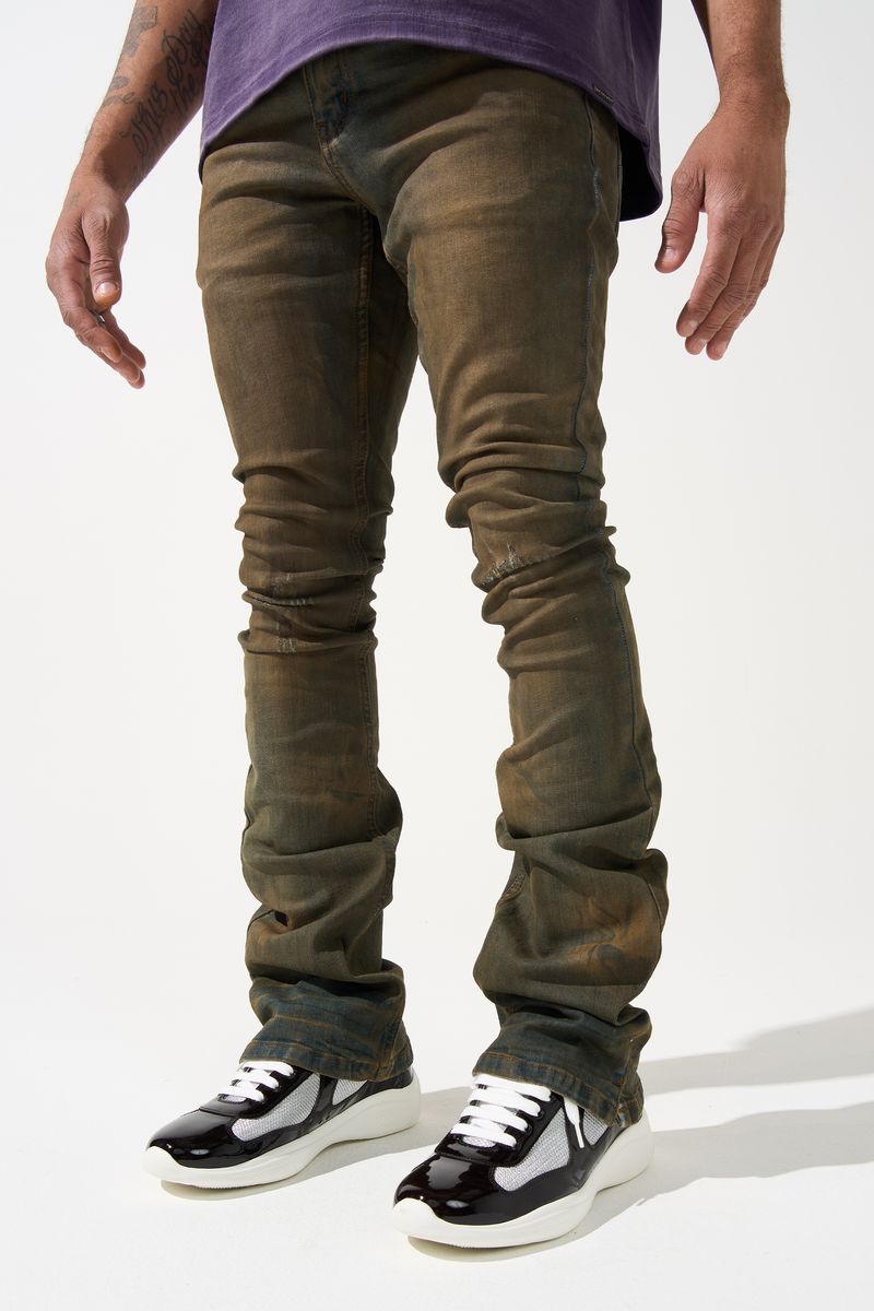 SERENEDE® OUD stacked jeans in dark denim with brown overdye, knee distressing, and signature stacked silhouette.