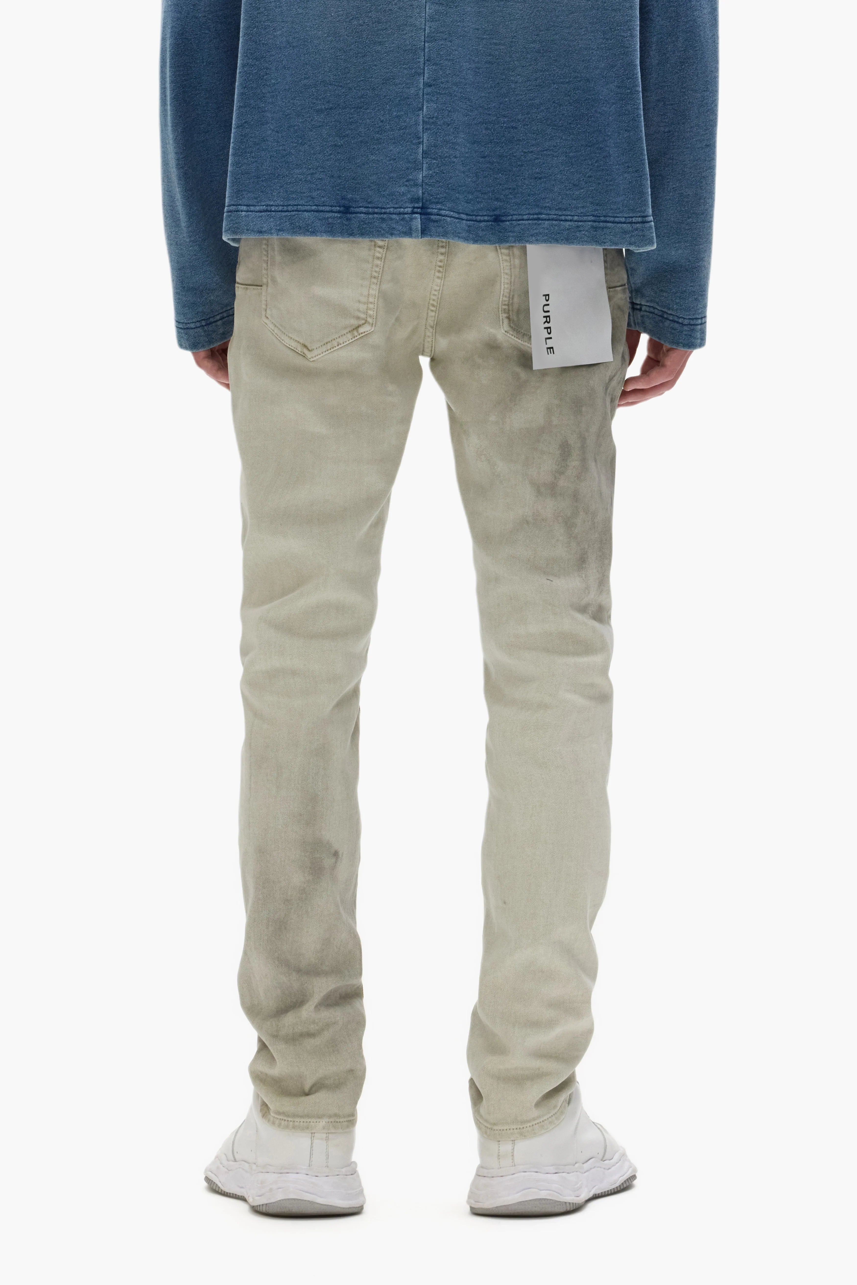 Purple Brand Pre-Fall 2025 stretch denim jeans in overdyed finish with 5-pocket design laid flat