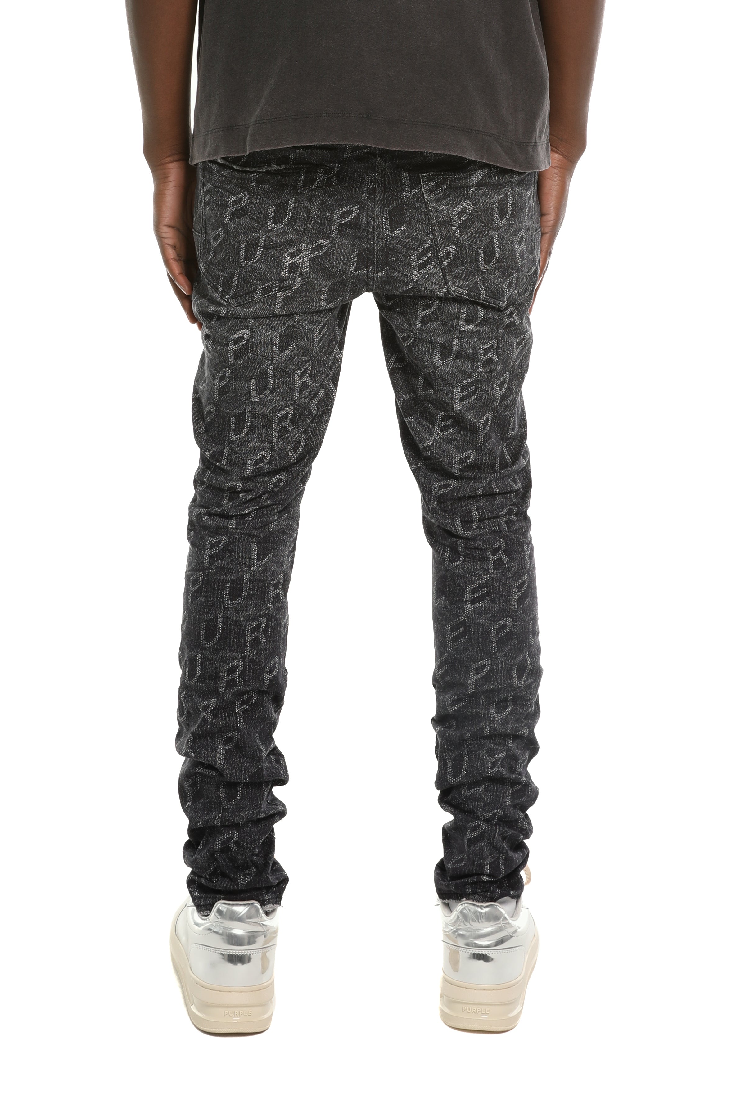 Purple Brand P001 Printed Monogram superskinny black jeans with dimensional monogram detailing and five-pocket design