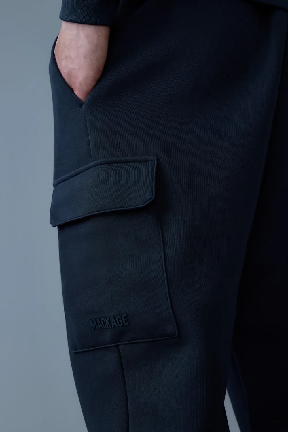 “MACKAGE MARVIN-R cargo sweatpants in soft double-face jersey, classic fit with elastic waistband and cuffs, flap patch pocket with silicone MACKAGE logo, slash waist pockets, back welt pocket, and contrast fabric detailing – luxury streetwear joggers for men.”