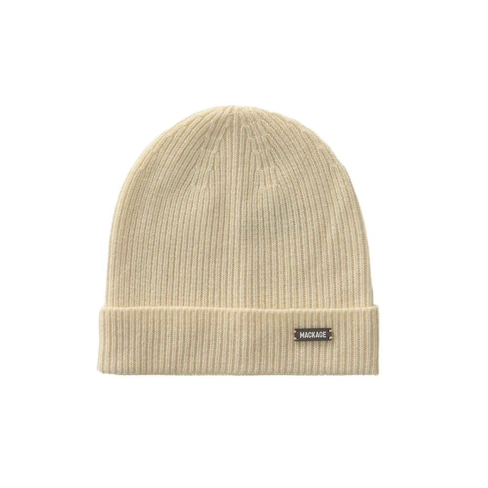 Beige knit beanie with a brand label on a white background