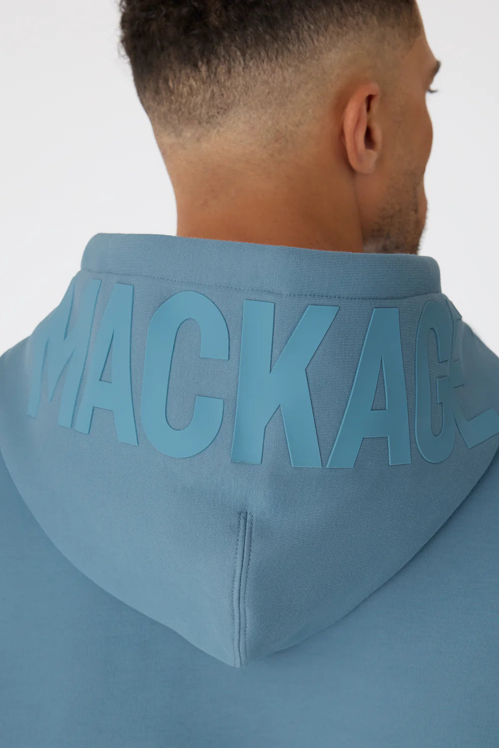 “MACKAGE KOLTON hoodie in soft double-face jersey, beige color, relaxed fit with kangaroo pocket, adjustable drawcord hood, and silicone MACKAGE logo at chest and hood – luxury streetwear sweatshirt for men.”