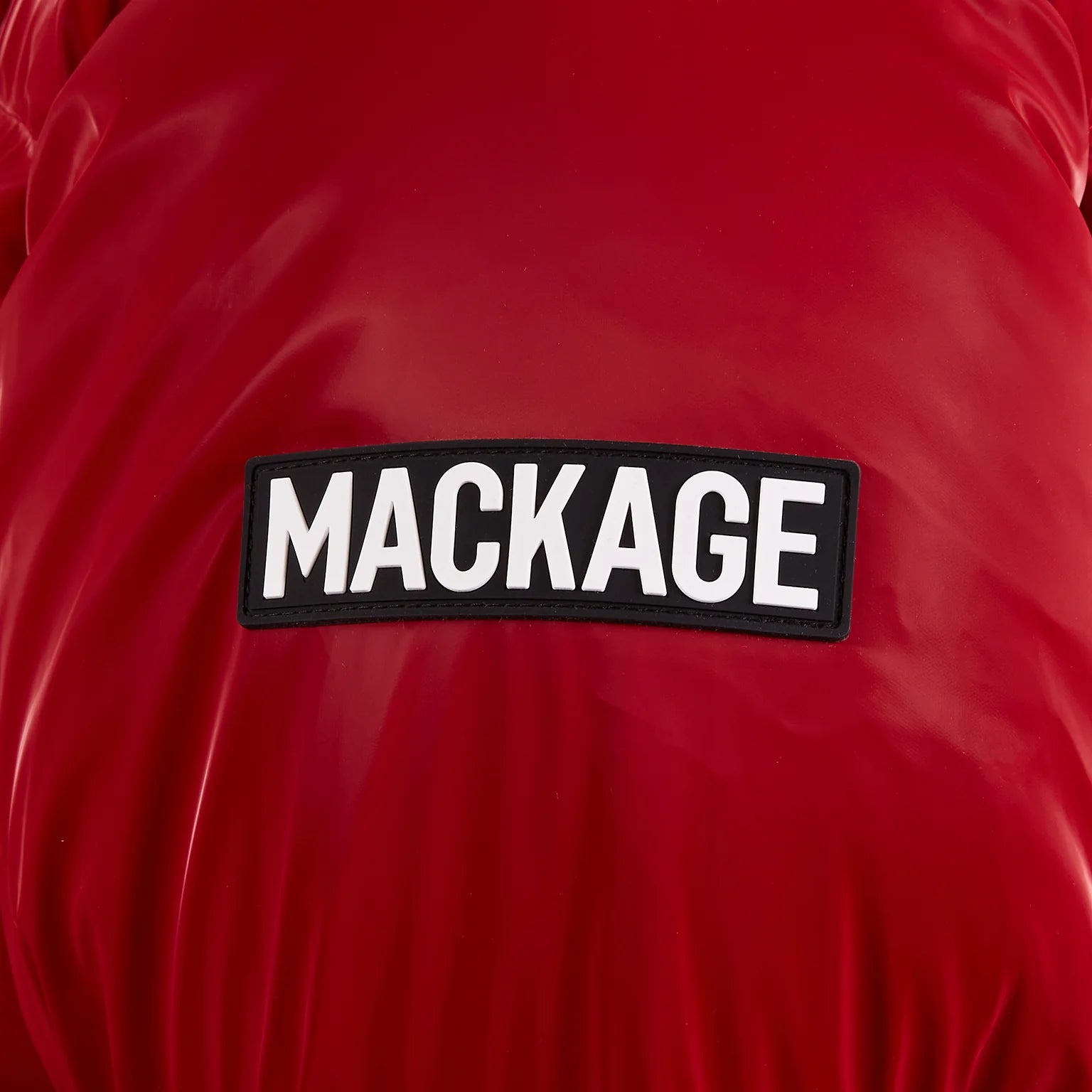 Mackage KENT-GLO high-gloss down jacket with removable hood, insulated pockets, and rib knit storm cuffs.