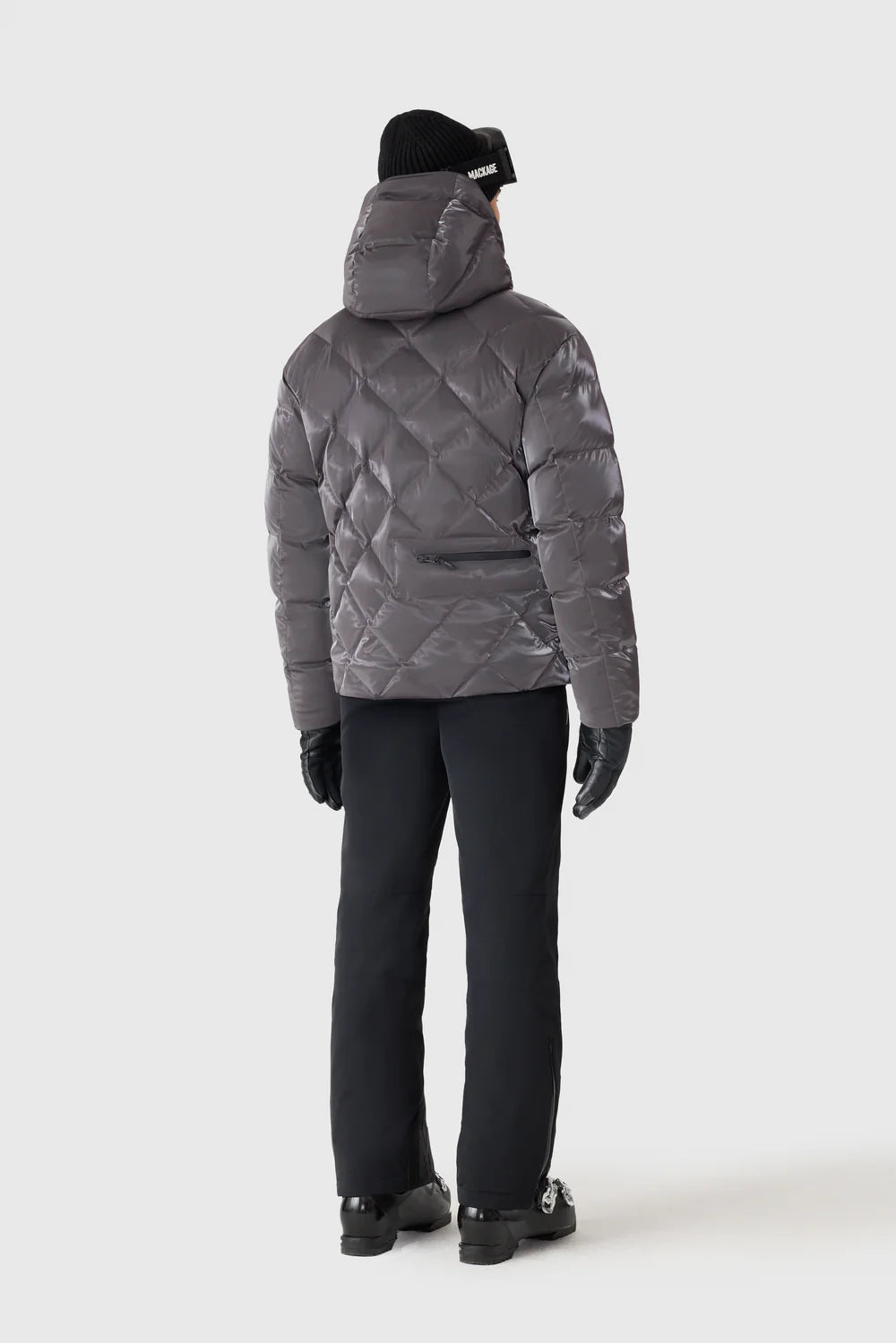 Mackage CILLIAN-GLO high-gloss quilted ski jacket with removable hood, powder skirt, and recycled down insulation.