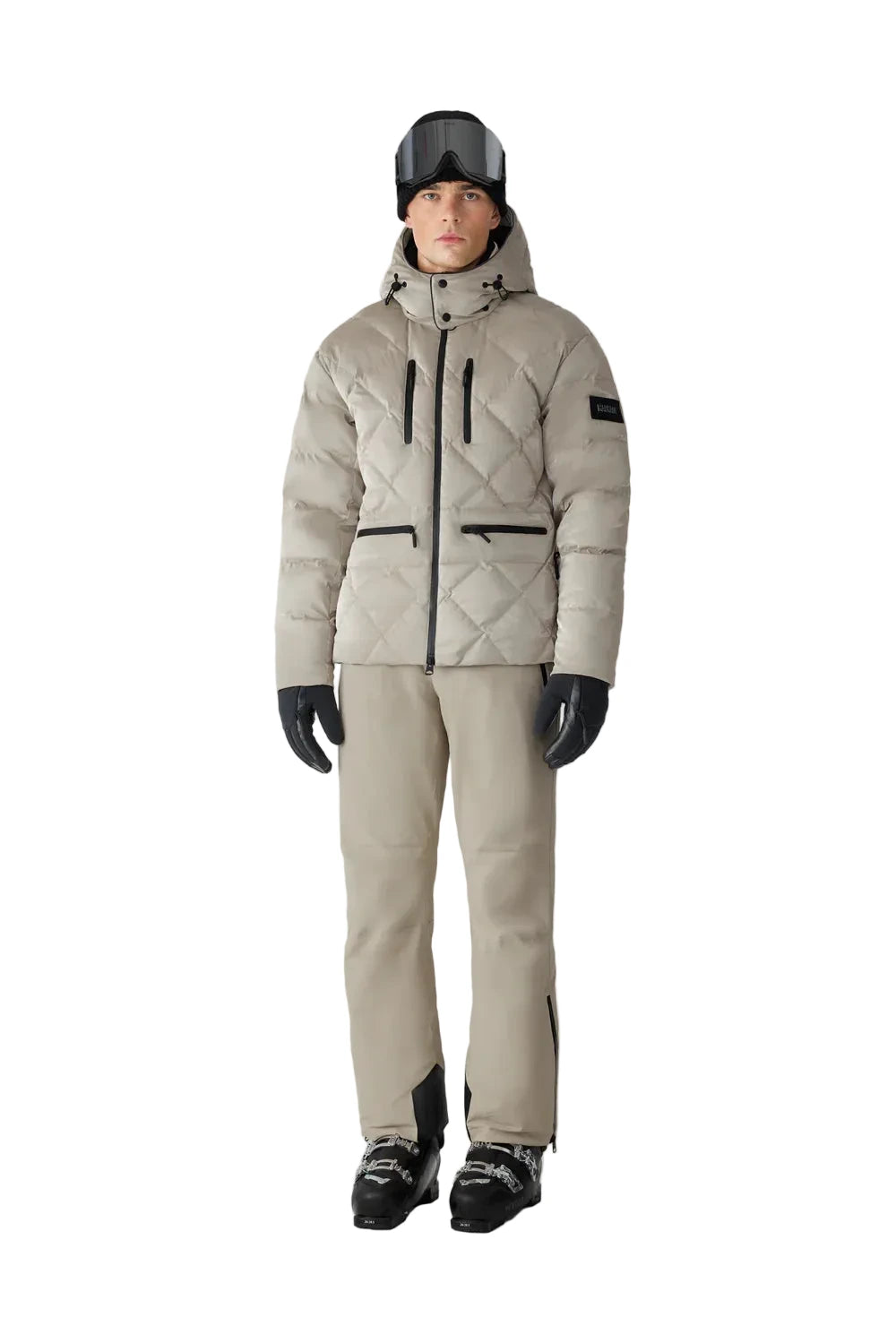 Mackage CILLIAN-GLO high-gloss quilted ski jacket with removable storm hood, powder skirt, and multiple utility pockets.