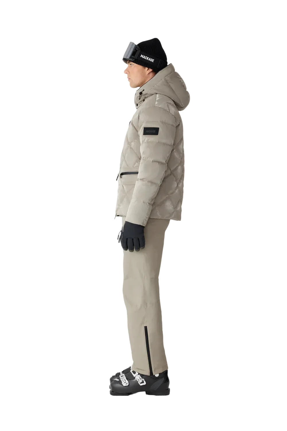 Mackage CILLIAN-GLO high-gloss quilted ski jacket with removable storm hood, powder skirt, and multiple utility pockets.