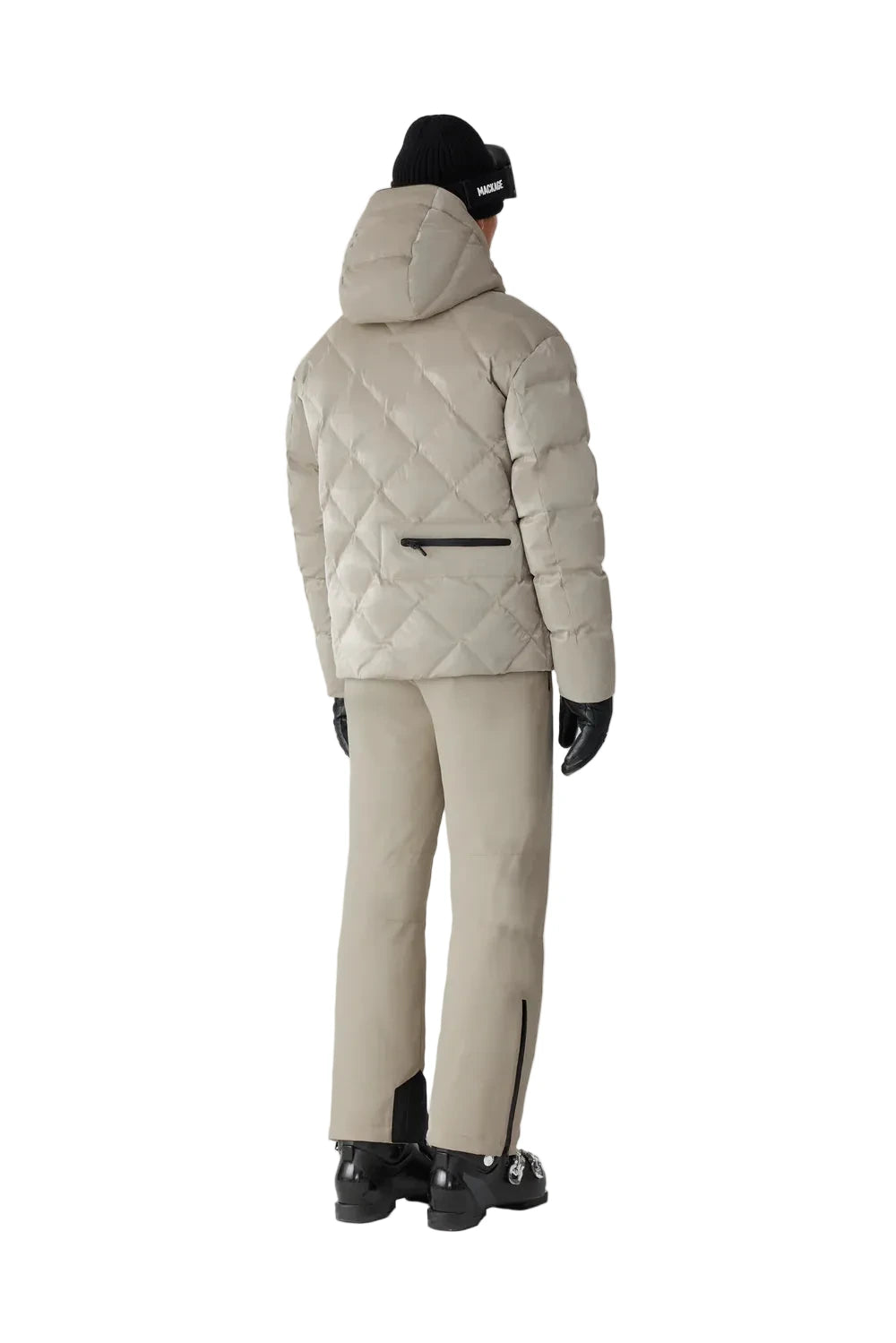 Mackage CILLIAN-GLO high-gloss quilted ski jacket with removable storm hood, powder skirt, and multiple utility pockets.