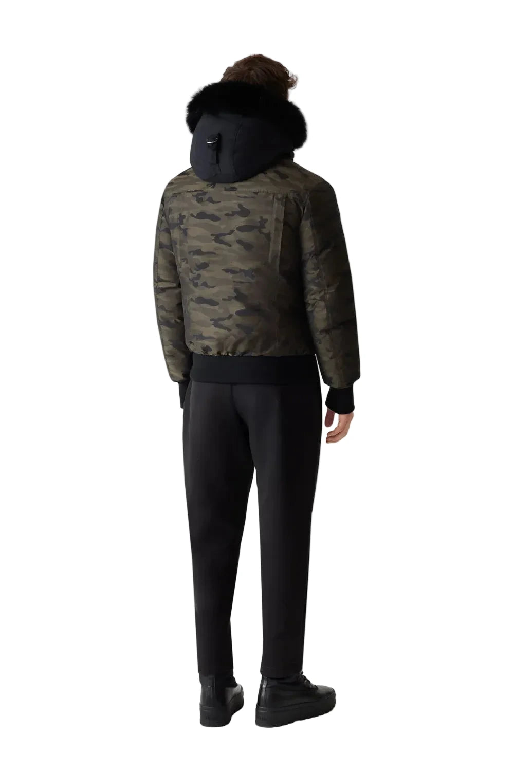 Mackage DIXON-JCZ down-filled bomber jacket with removable bib, fur-trimmed hood, and jacquard camouflage pattern.