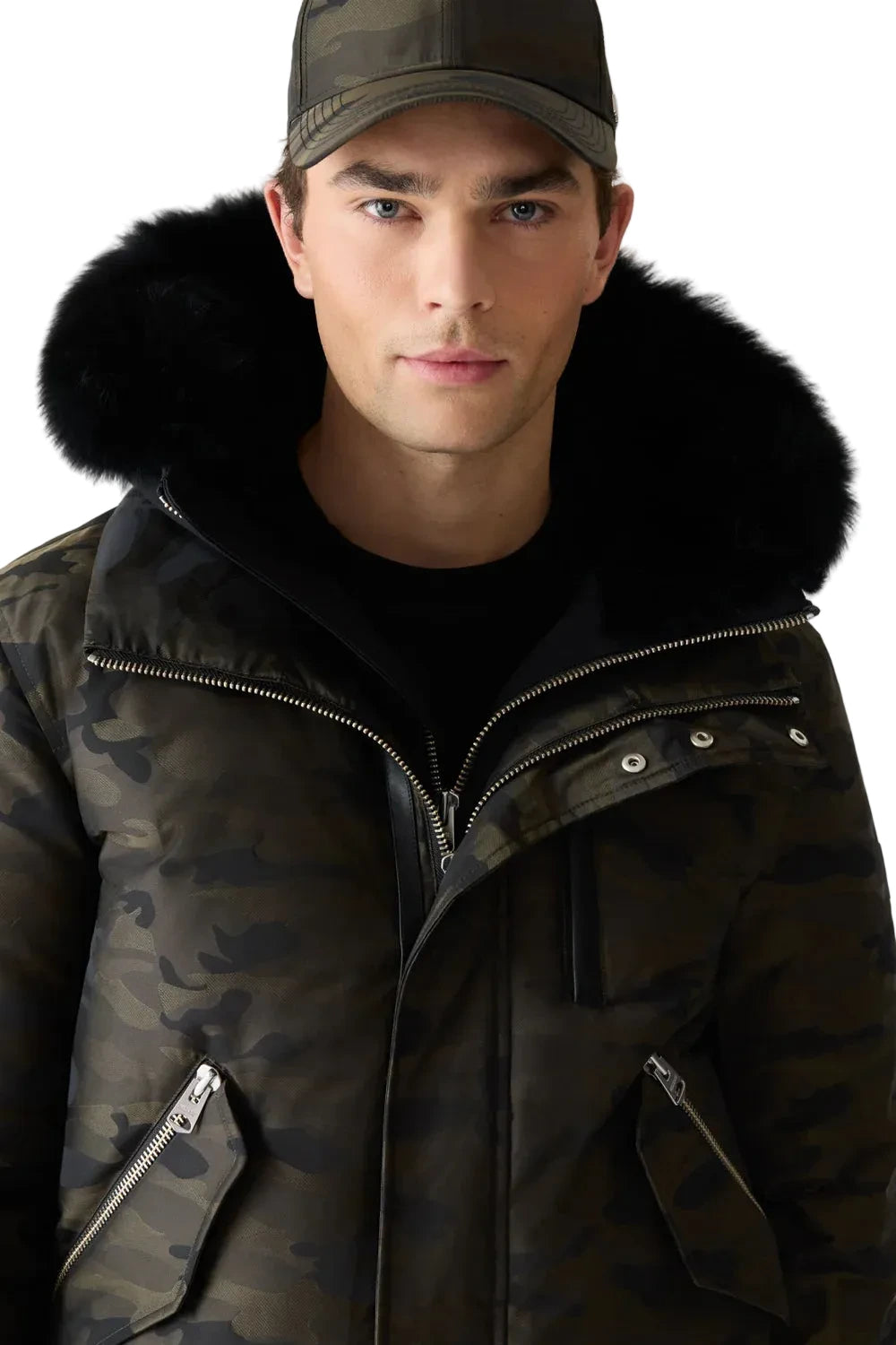 Mackage DIXON-JCZ down-filled bomber jacket with removable bib, fur-trimmed hood, and jacquard camouflage pattern.