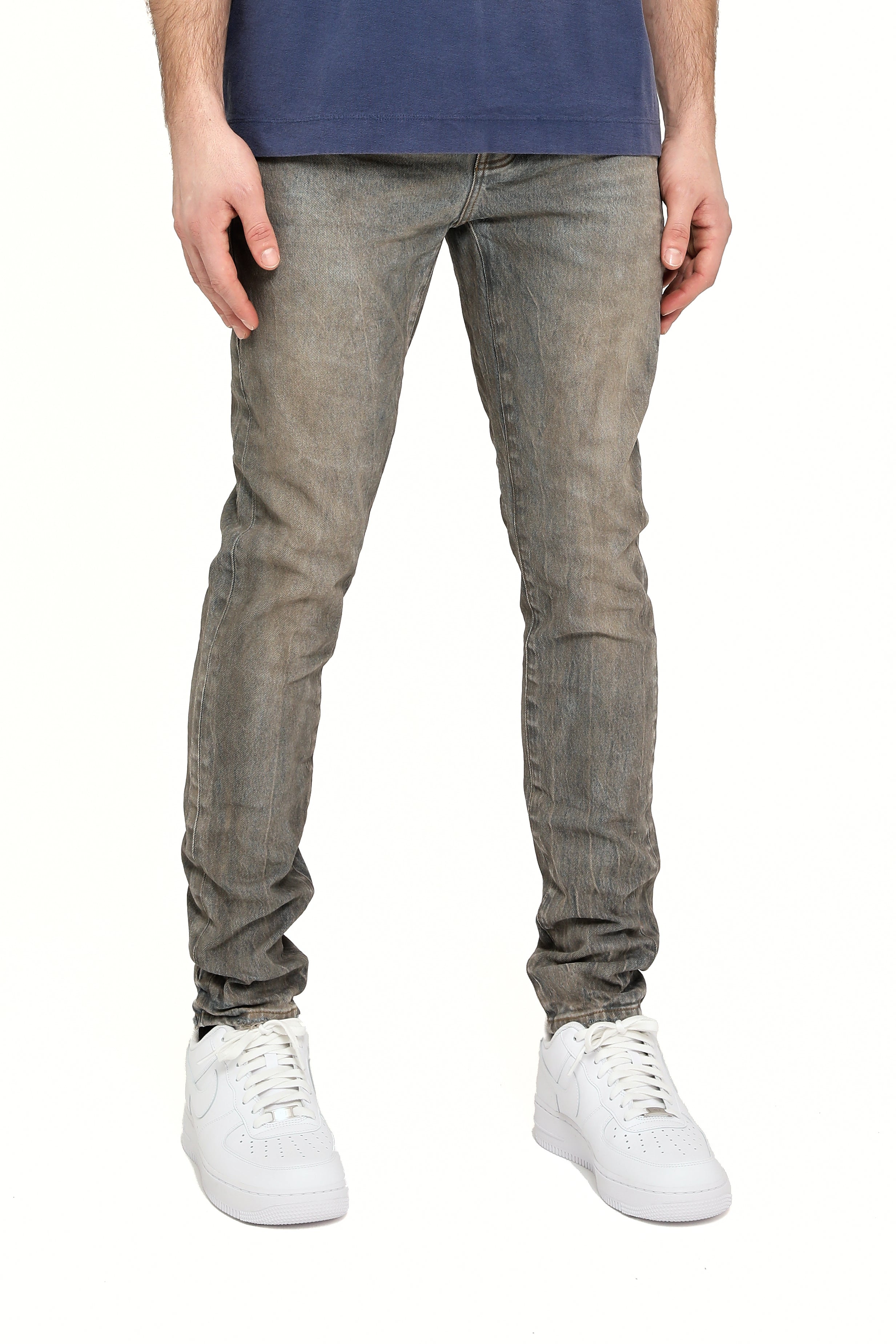 Purple Brand Repair Blowout Jeans in mid indigo wash with distressed blowout details, repaired accents, and slim tapered fit.
