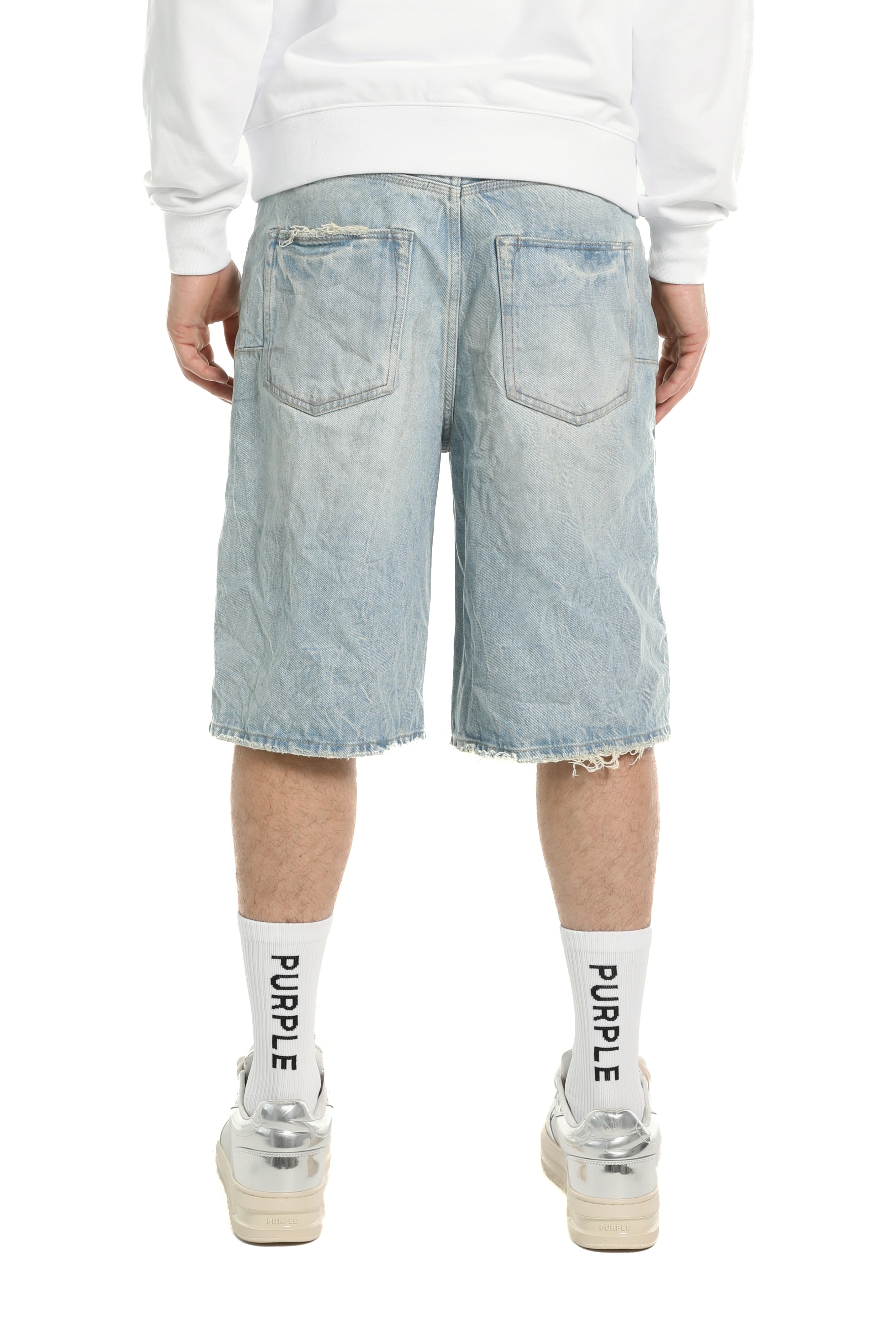 Purple Brand white label wide leg pants in 100% cotton with raw cut hem, five-pocket styling, and button fly