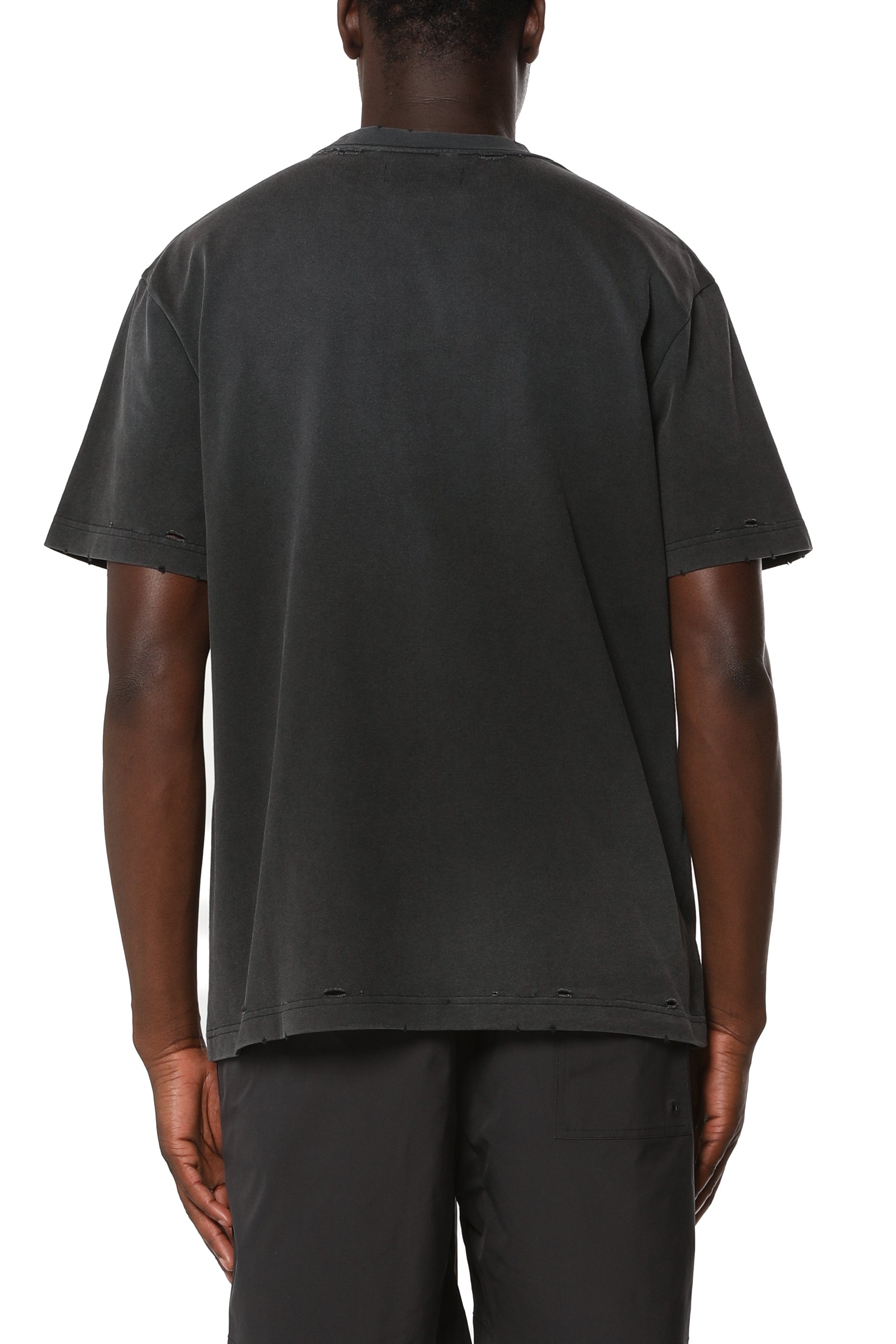  P117-Purple Brand heavyweight cotton graphic T-shirt featuring a distressed finish with nicks, holes, heavy fading, bleach stains, and neon graphic detailing.