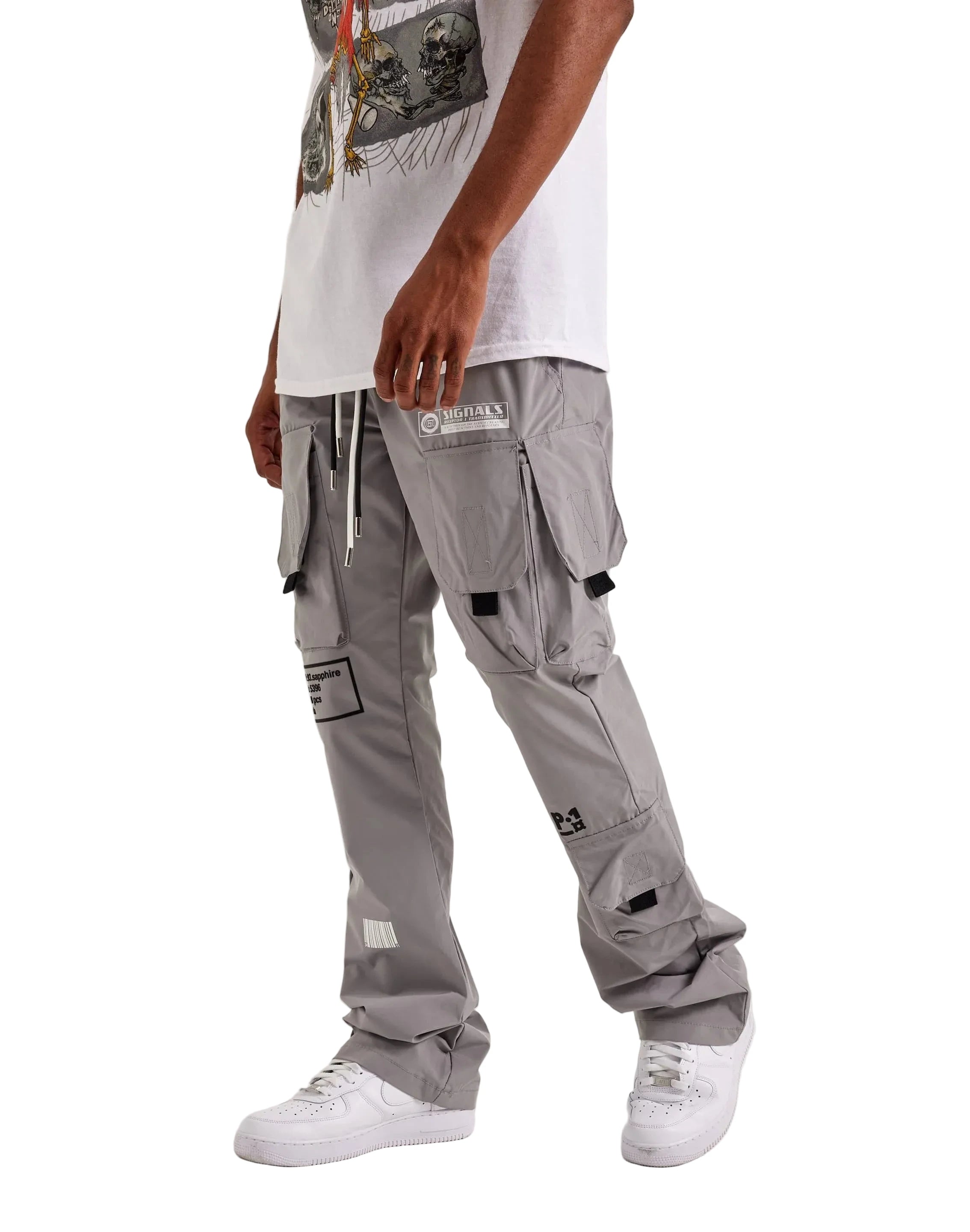 Kloud9 Grey Nylon Flare Cargo Pants with adjustable drawstring waist, front cargo pockets, side pockets, flared hems, and printed graphics