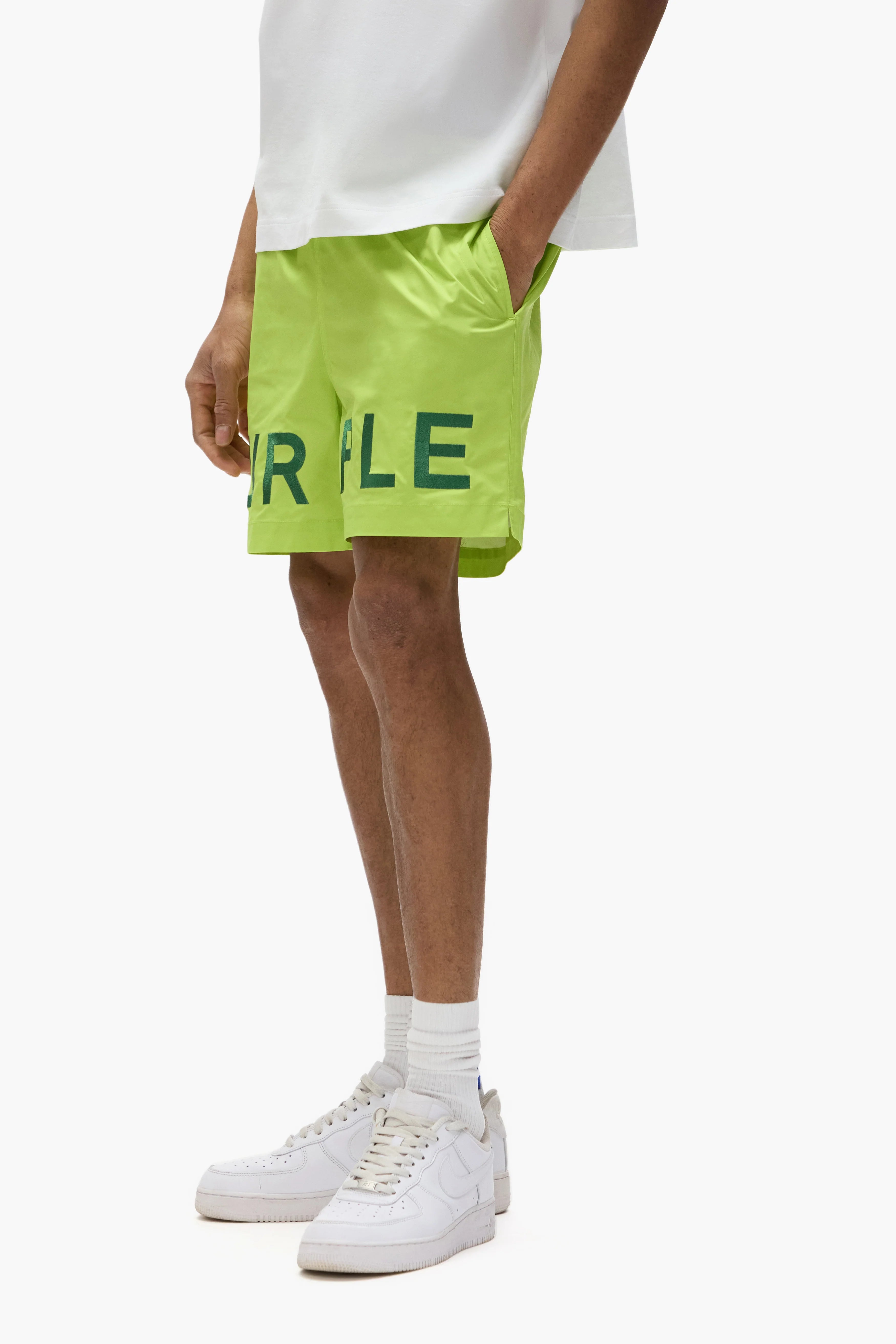 Purple Brand water-repellent woven shorts with bold embroidery on both legs, elastic waistband, and drawcord detailing.