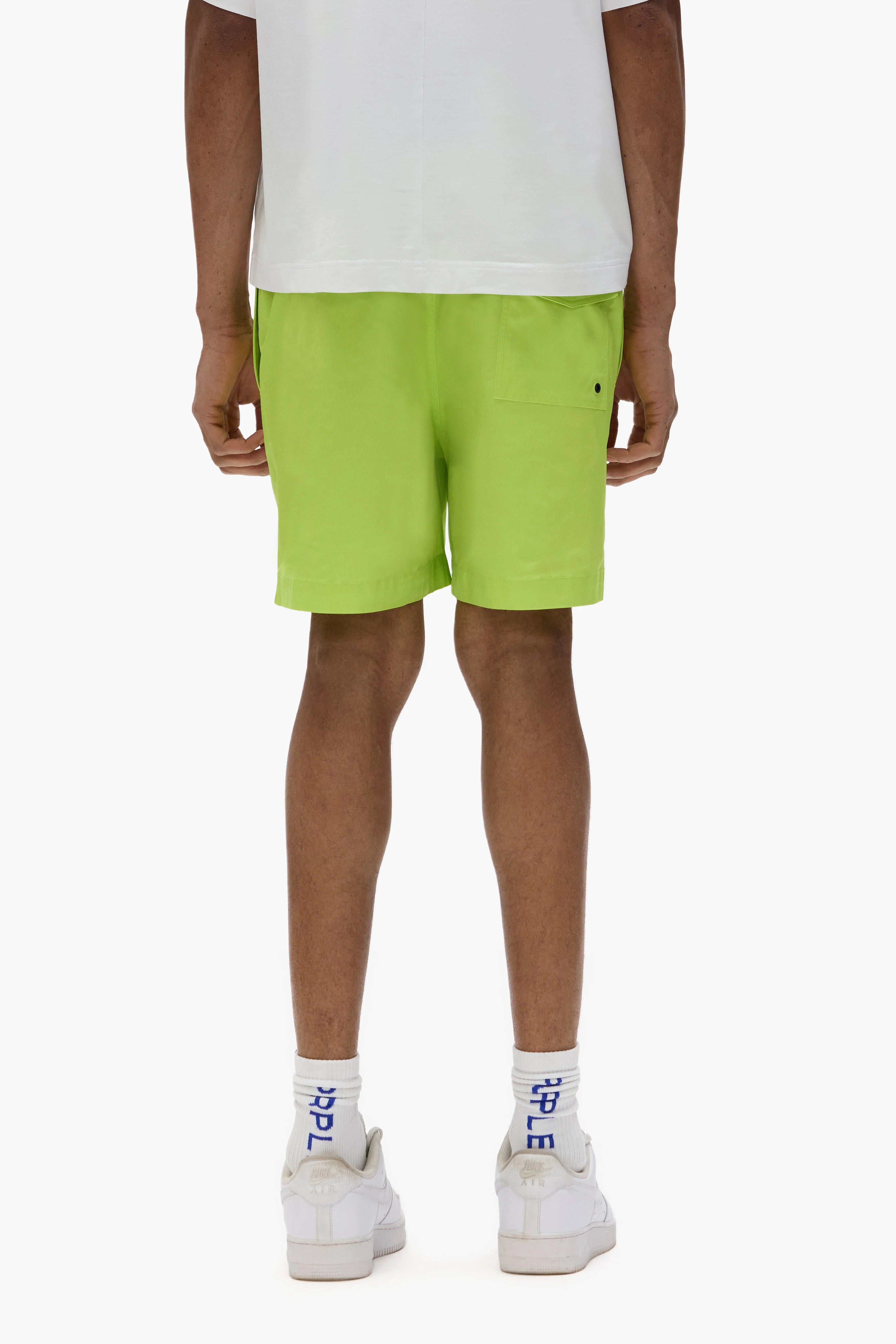 Purple Brand water-repellent woven shorts with bold embroidery on both legs, elastic waistband, and drawcord detailing.