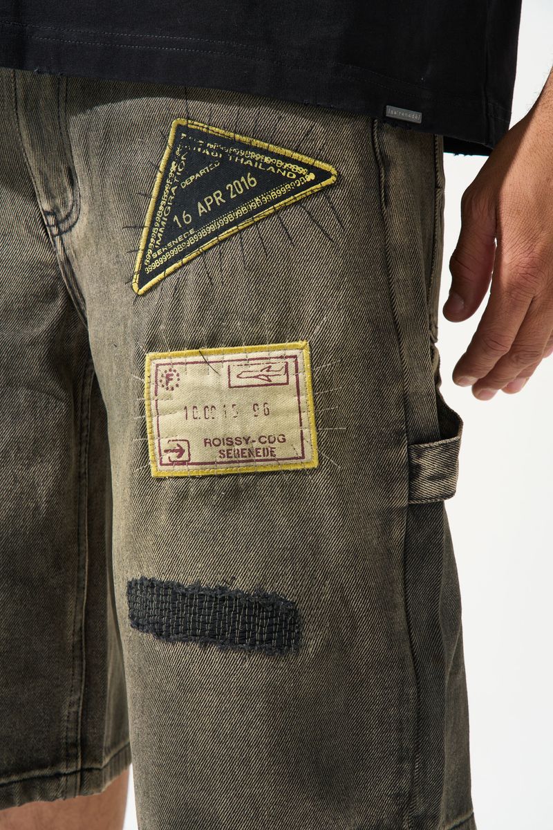 SERENEDE PASSPORT denim shorts in a deep charcoal wash with an earthy tint, premium structured denim, vintage-inspired details, and signature branded hardware.