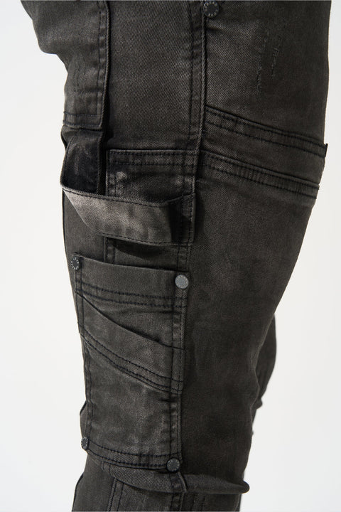 SERENEDE® RAIN smoke grey stacked jeans with carpenter panels, extended length, fitted silhouette, leather waistband patch, and branded hardware.