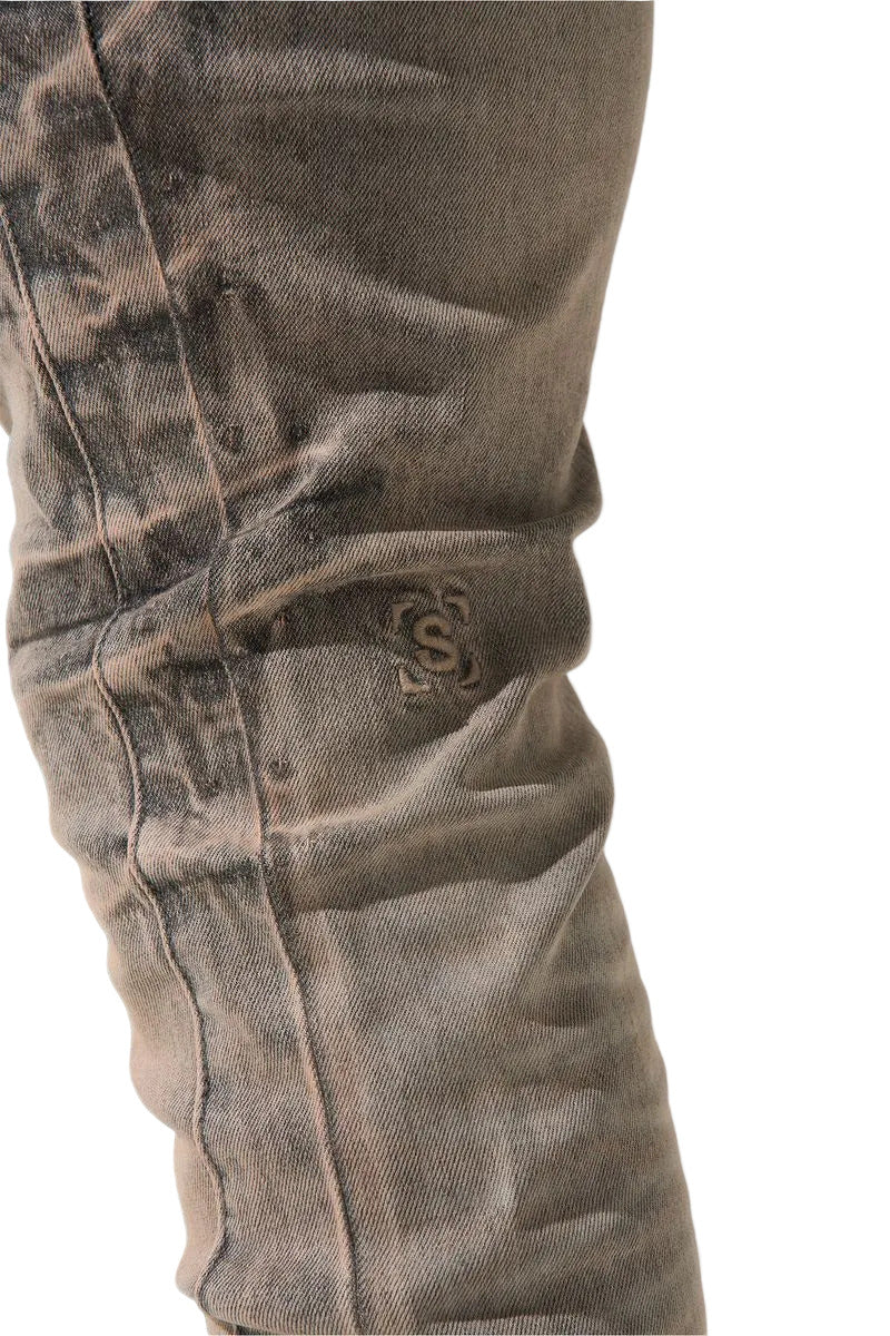SERENEDE SANGROSE men's jeans in a vintage grey wash with rose pink accents, whiskering, side panels, and signature fitted denim construction.