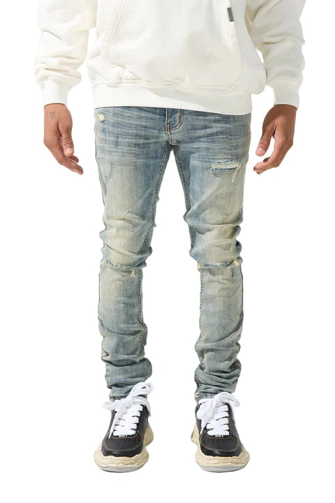 SERENEDE® SEDONA 2.0 vintage earth tone skinny jeans with high-stretch fabric, fading and distressing, tapered ankles, leather waistband patch, and branded hardware