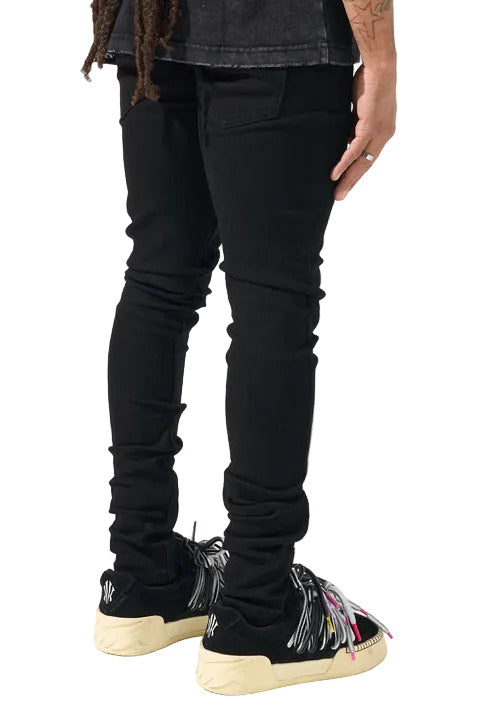 SERENEDE black stacked denim jeans with a slim fitted silhouette, stretch construction, and signature stacked ankle detailing.
