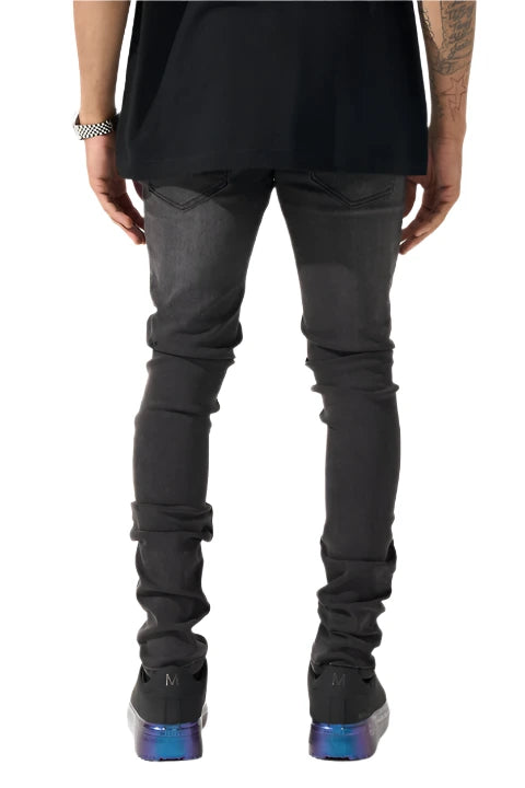 "SERENEDE® SHADOW33 skinny jeans in charcoal wash with tonal distressing and tapered ankle design.