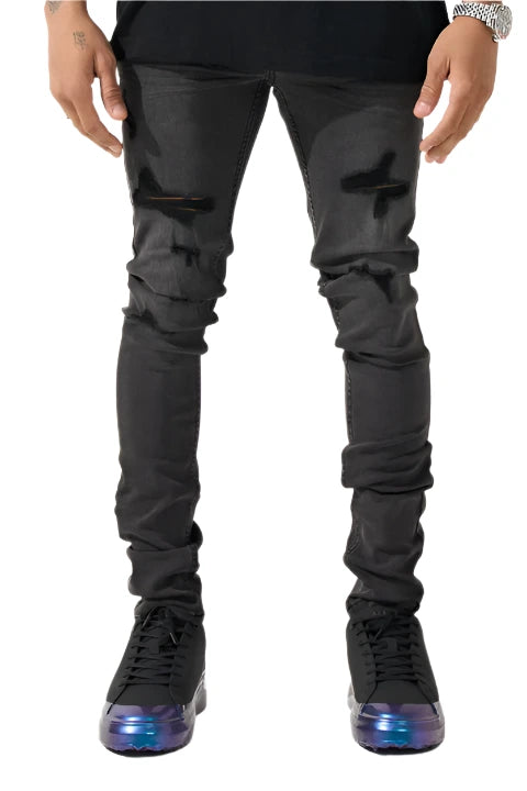 "SERENEDE® SHADOW33 skinny jeans in charcoal wash with tonal distressing and tapered ankle design.