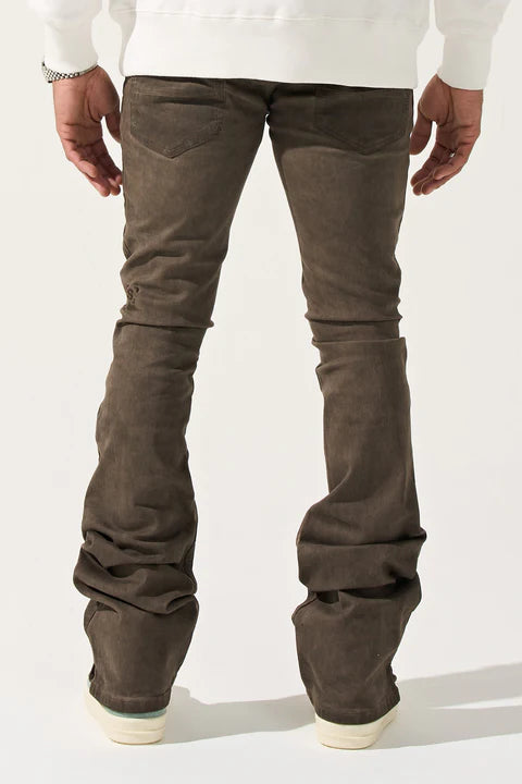 SERENEDE® SARLAT brown overdyed stacked jeans with fitted construction, extended length, multi-sized gems, leather waistband patch, holographic hangtag, and branded hardware