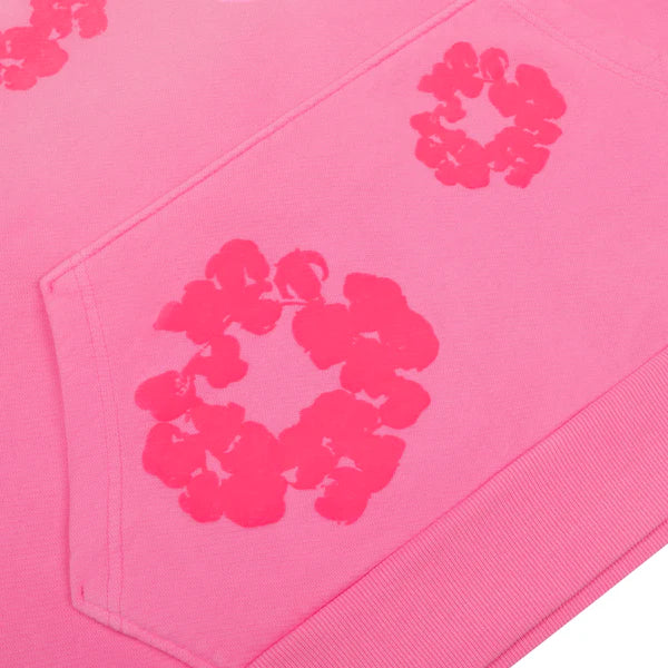 Denim Tears Mono Cotton Wreath Hoodie in pink with sun-faded washed finish, regular fit, made from 100% cotton.