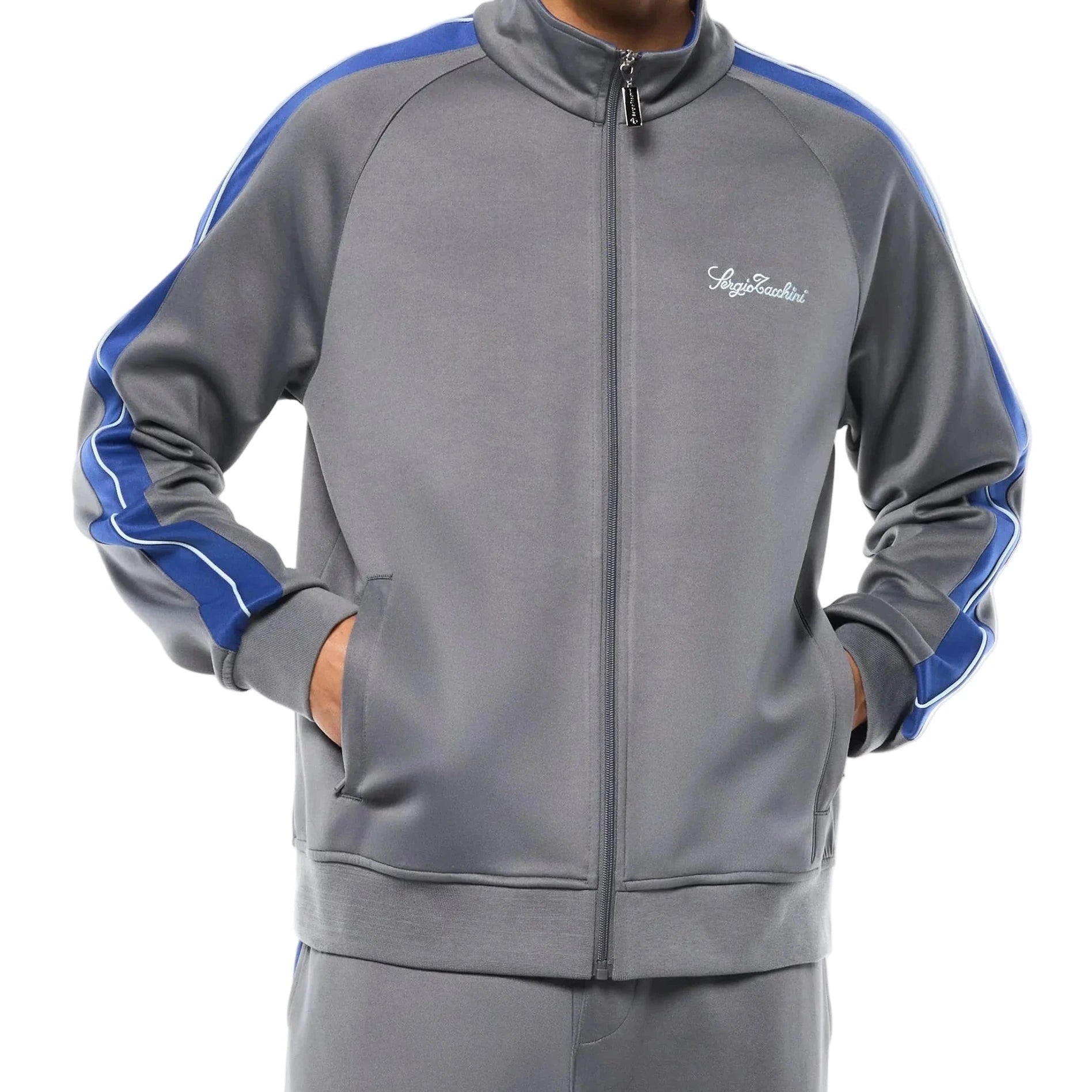 Premium track pants with elastic waistband, rear zippered welt pocket, embroidered Sergio Tacchini logo, contrast panels and piping, and adjustable ankle zips