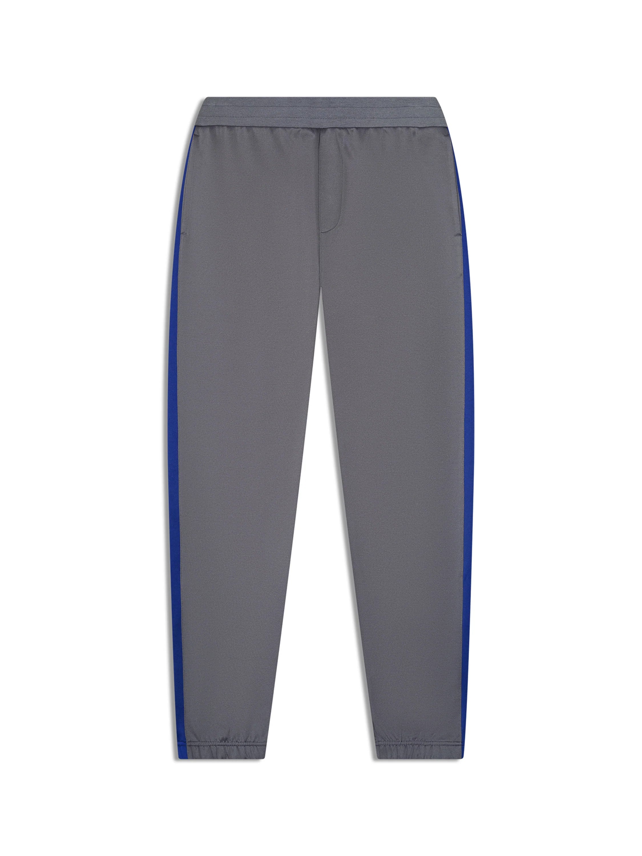 Premium track pants with elastic waistband, rear zippered welt pocket, embroidered Sergio Tacchini logo, contrast panels and piping down legs, and adjustable ankle zips